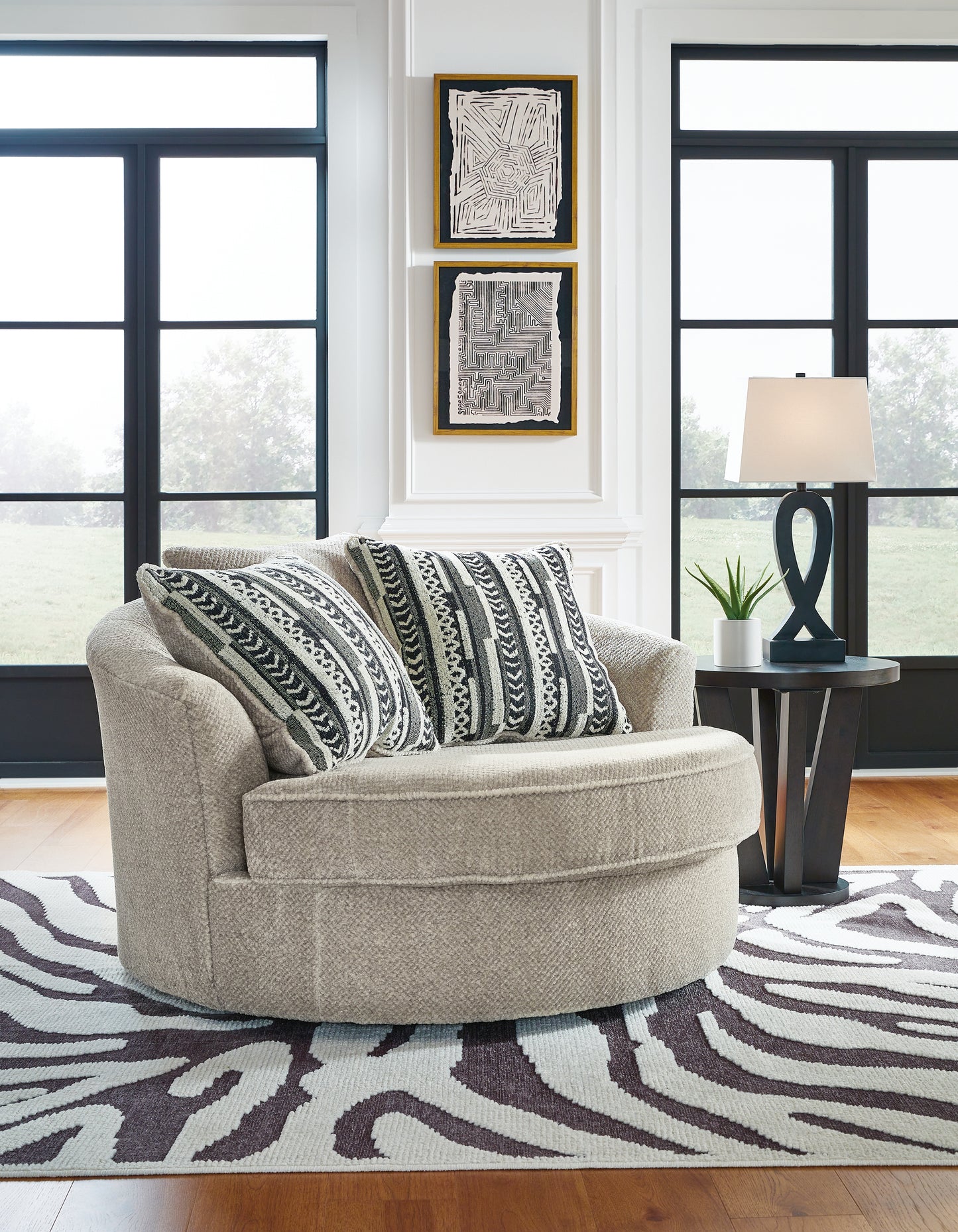 The Furniture Outlets - Ashley Furniture - Calnita Living Room - Oversized Swivel Accent Chair / Sisal - 2050221