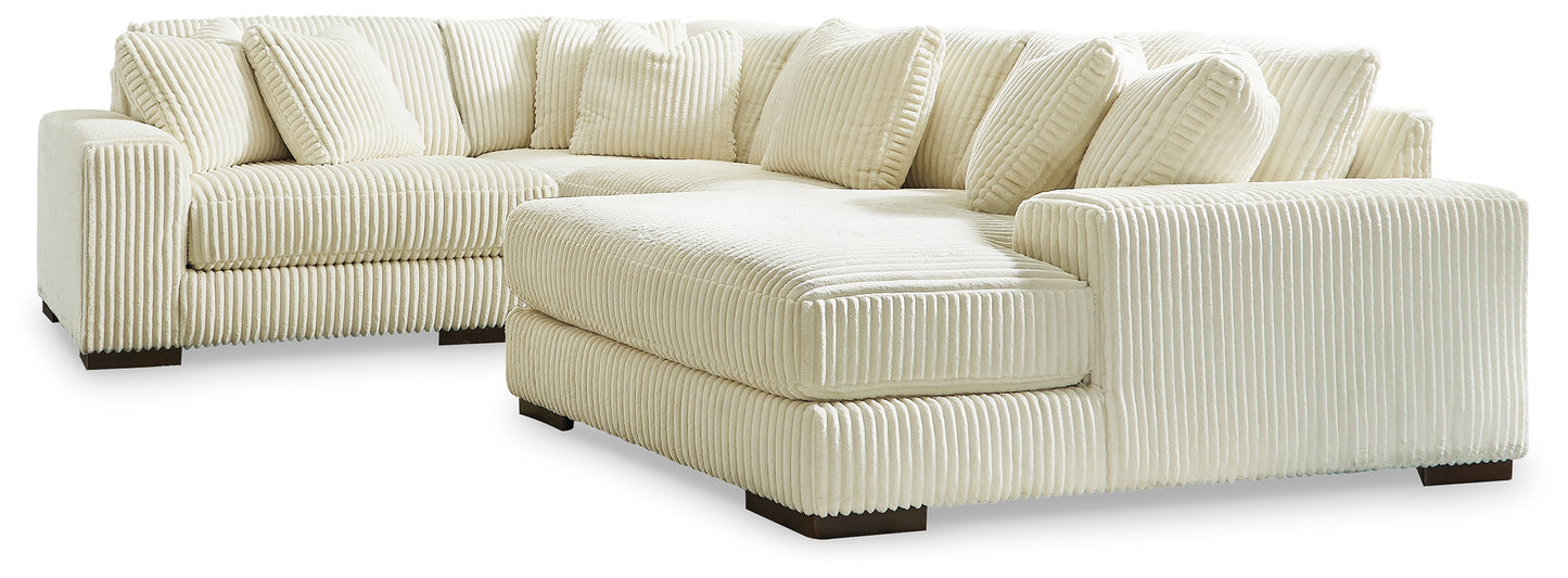 The Furniture Outlets - Ashley Furniture - Lindyn Sectional - RAF 4-Piece Sectional with Chaise / Ivory - 21104S15