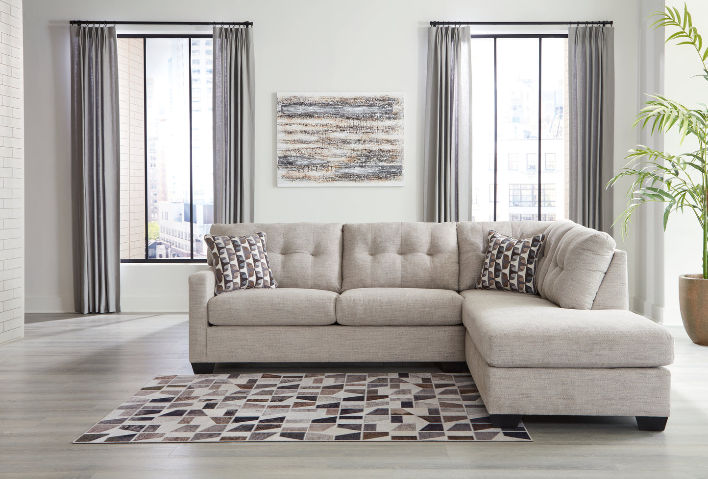 The Furniture Outlets - Ashley Furniture - Mahoney Sectional - LAF 2-Piece Sectional with Chaise / Pebble - 31004S2