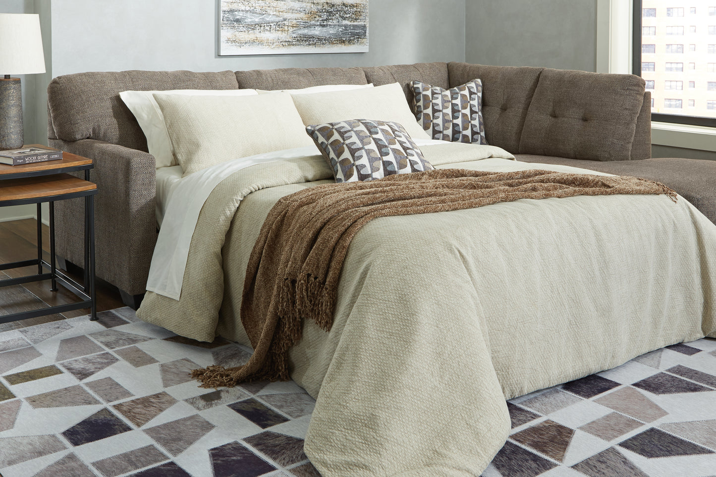 The Furniture Outlets - Ashley Furniture - Mahoney Sectional - 2-Piece Sleeper Sectional with Chaise / Chocolate - 31005S4