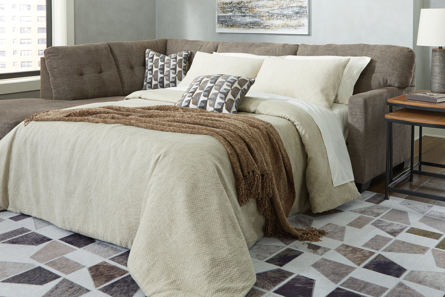 The Furniture Outlets - Ashley Furniture - Mahoney Sectional - RAF 2-Piece Sleeper Sectional with Chaise / Chocolate - 31005S3
