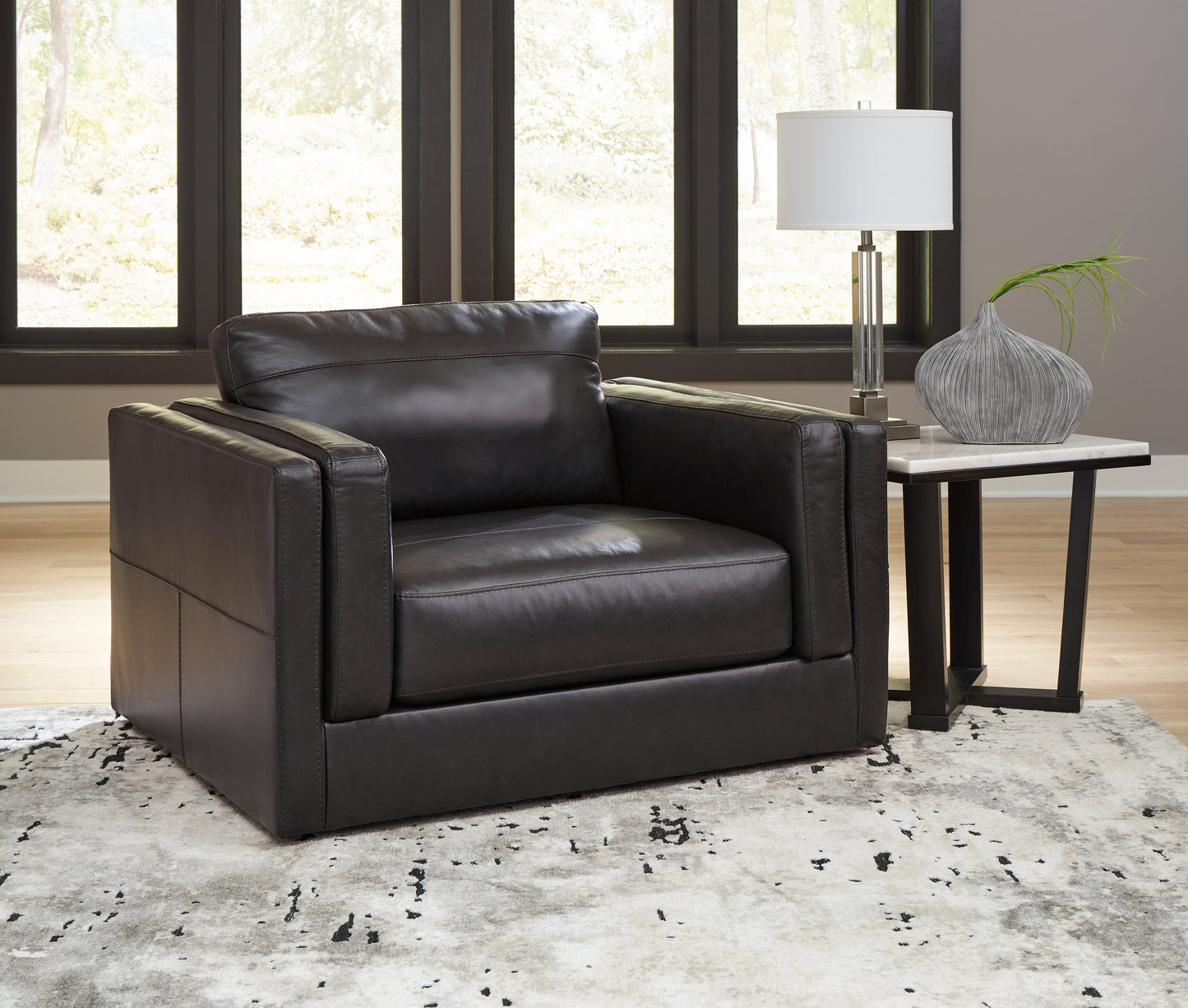 The Furniture Outlets - Ashley Furniture - Amiata Living Room - Chair and a Half / Onyx - 5740523