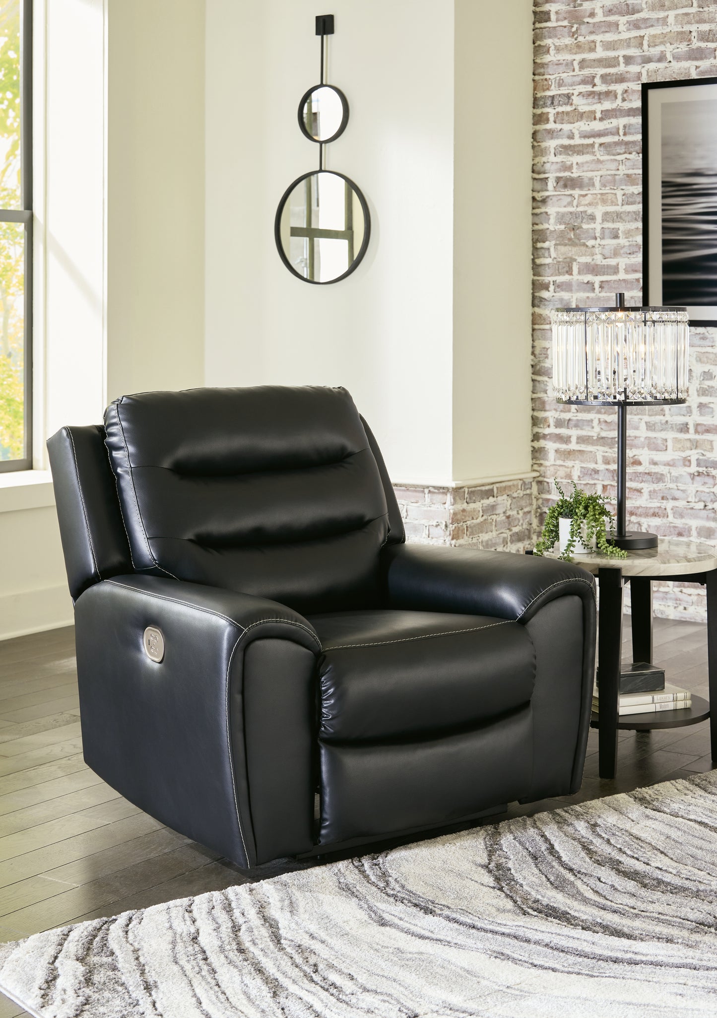 The Furniture Outlets - Ashley Furniture - Warlin Living Room - PWR Recliner/ADJ Headrest / Black - 6110513