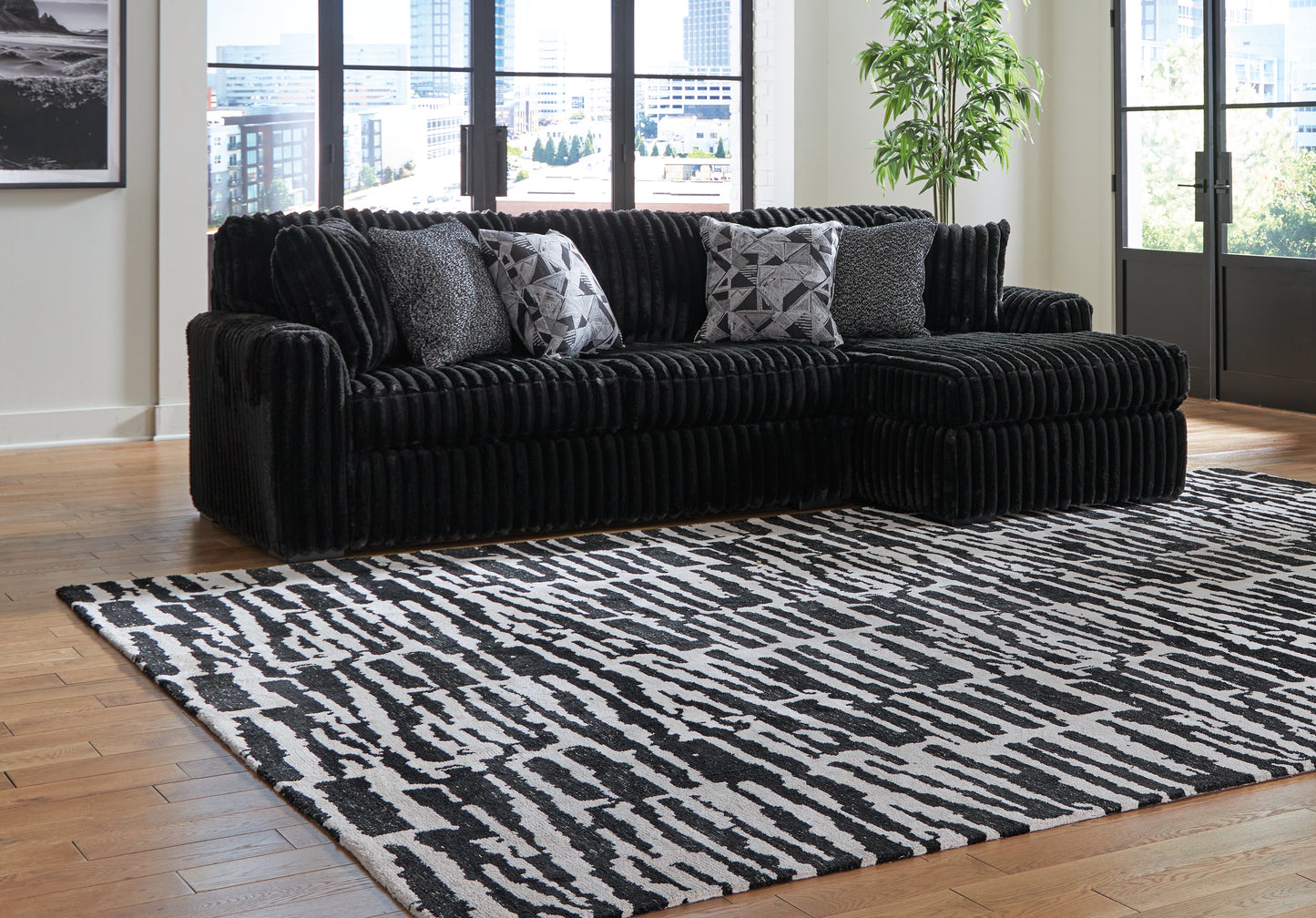 The Furniture Outlets - Ashley Furniture - Midnight-Madness Sectional - LAF 2-Piece Sectional Sofa with Chaise / Onyx - 98103S2