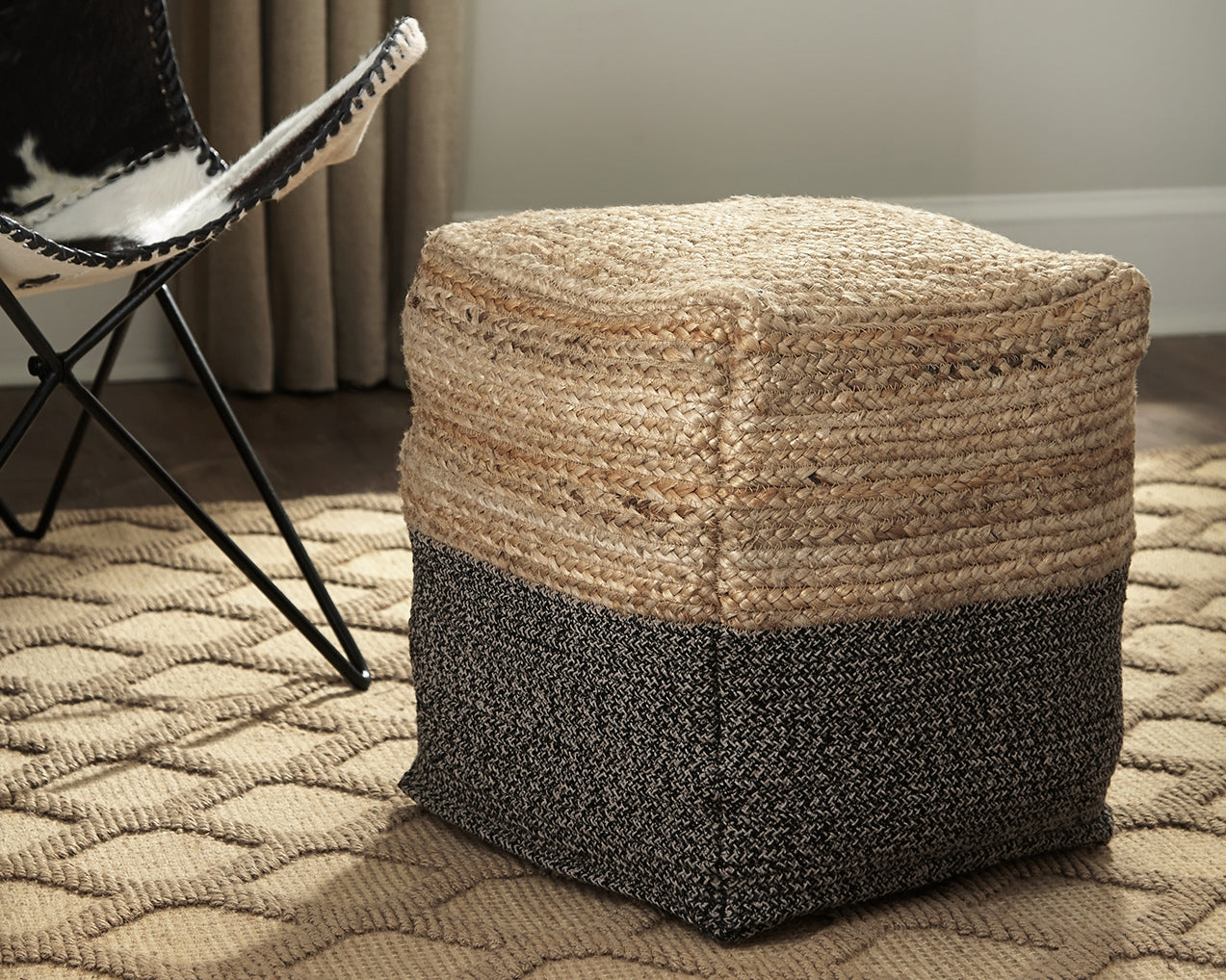 The Furniture Outlets - Ashley Furniture - Sweed Valley Pouf - Pouf / Natural/Black - A1000422