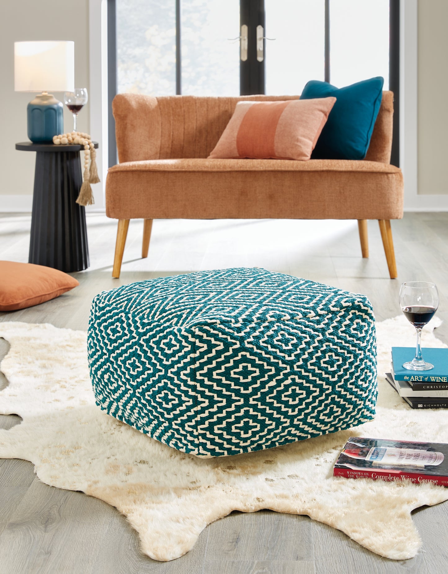 The Furniture Outlets - Ashley Furniture - Brynnsen Pouf - Pouf / Teal/Ivory - A1001055