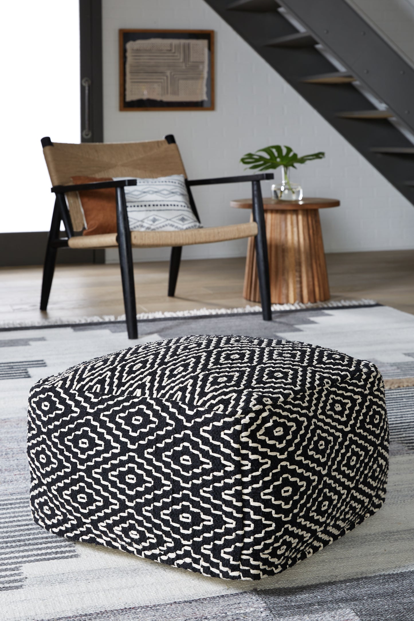 The Furniture Outlets - Ashley Furniture - Jasett Pouf - Pouf / Black/Ivory - A1001058