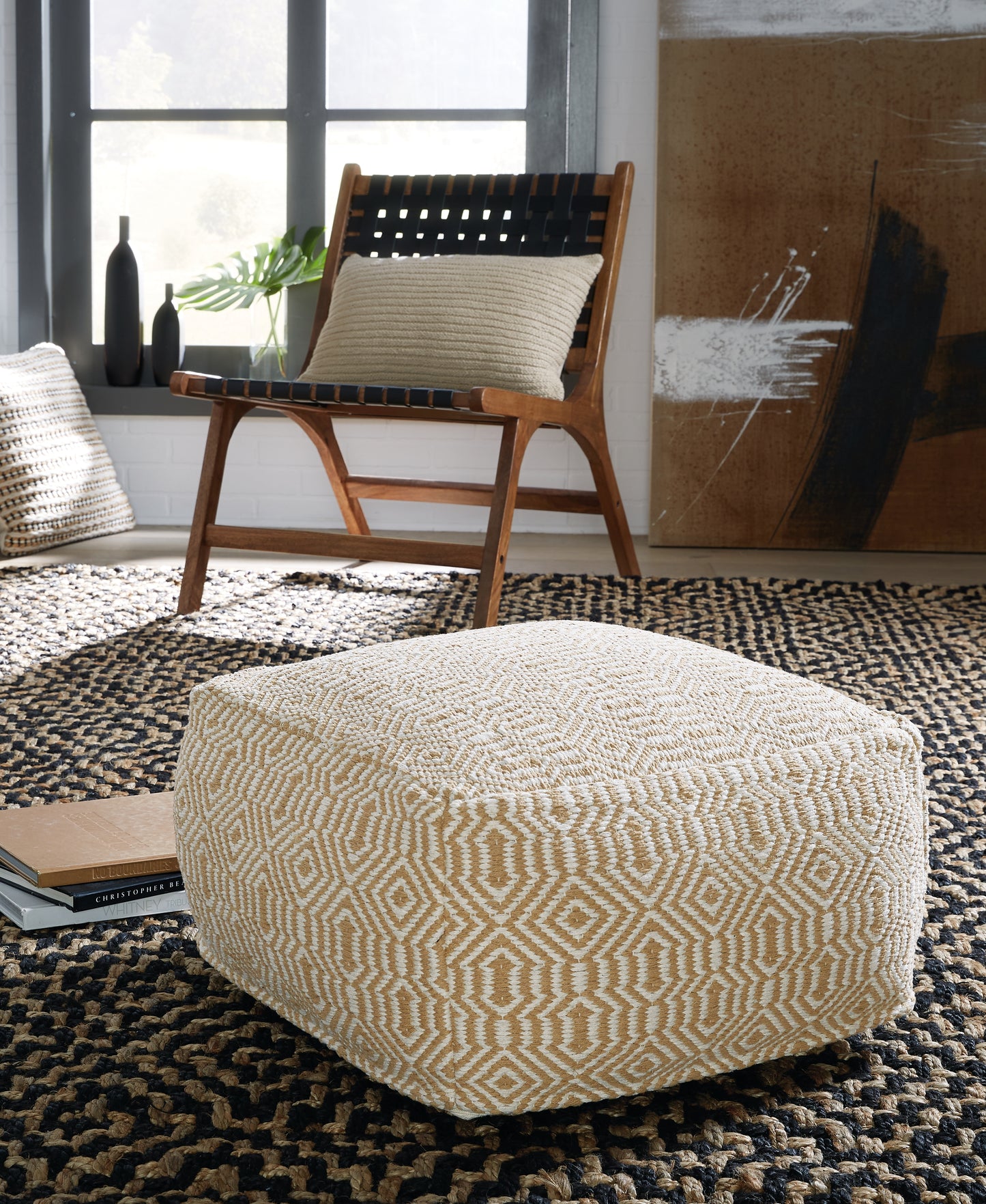The Furniture Outlets - Ashley Furniture - Adamont Pouf - Pouf / Tan/Ivory - A1001059