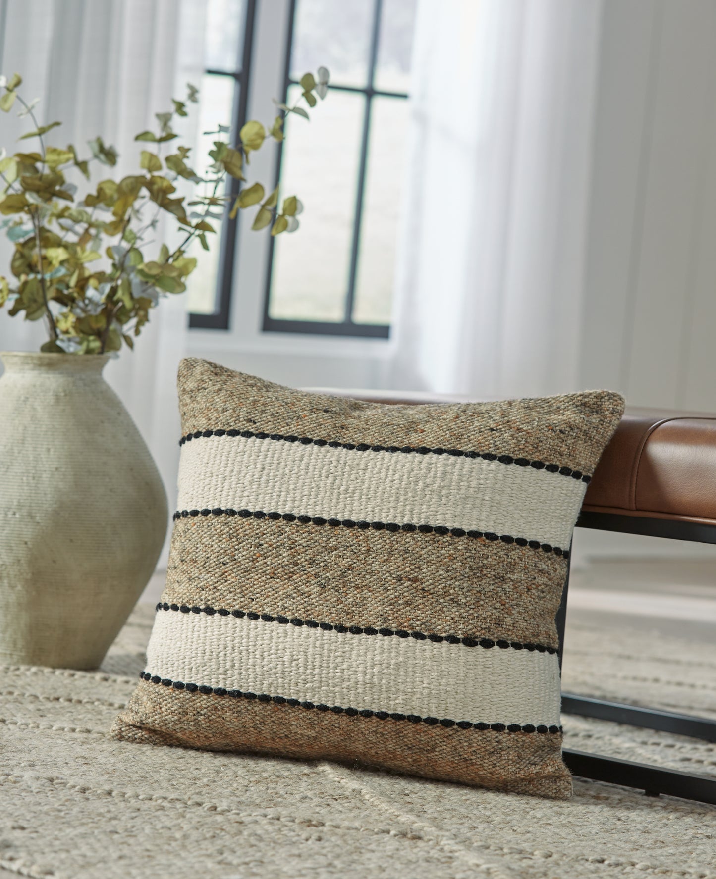 The Furniture Outlets - Ashley Furniture - Rueford Pillows - Pillow (4/CS) / Brown/Black/Natural - A1001063