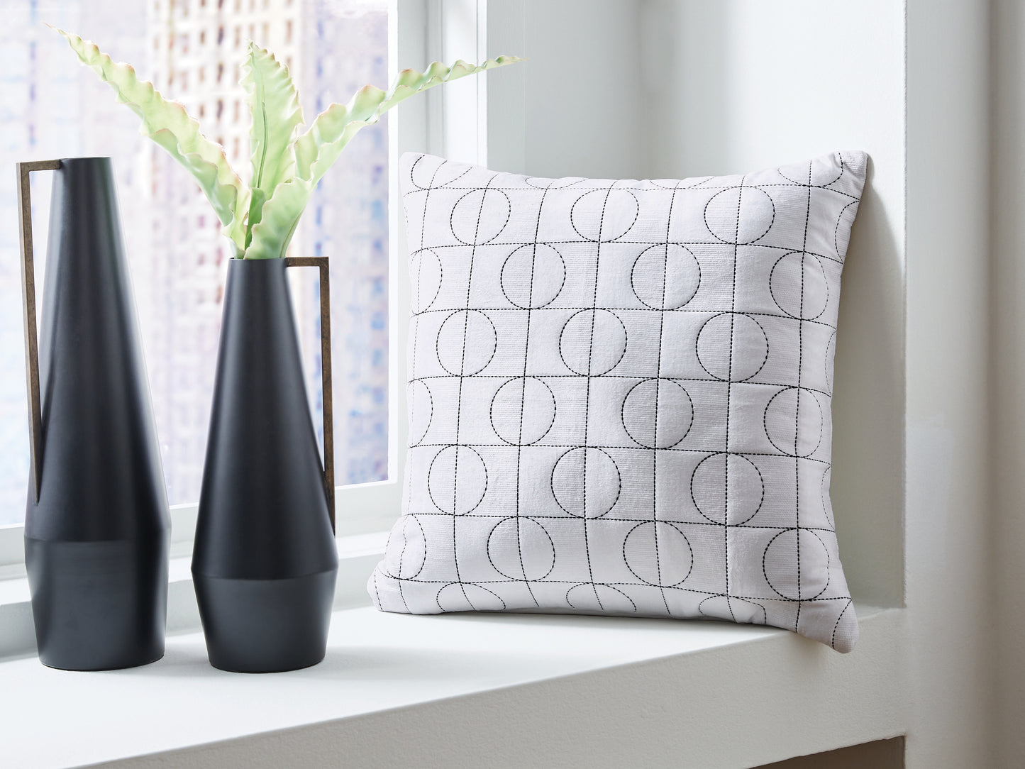 The Furniture Outlets - Ashley Furniture - Kydner Pillows - Pillow (4/CS) / White/Black - A1001107