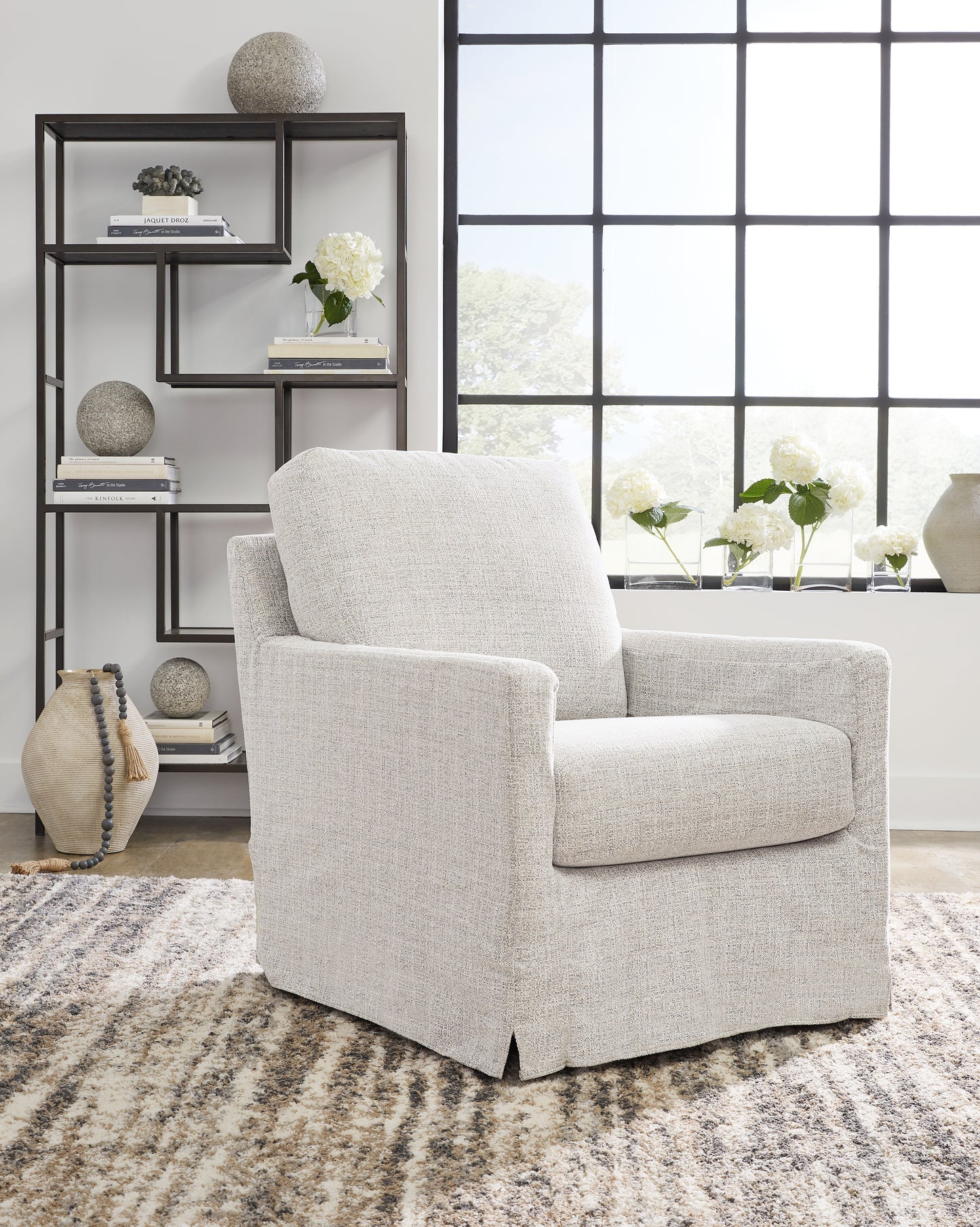 The Furniture Outlets - Ashley Furniture - Nenana Next-Gen Nuvella Swivel Glider Accent Chair - Swivel Glider Accent Chair / Stone - A3000644