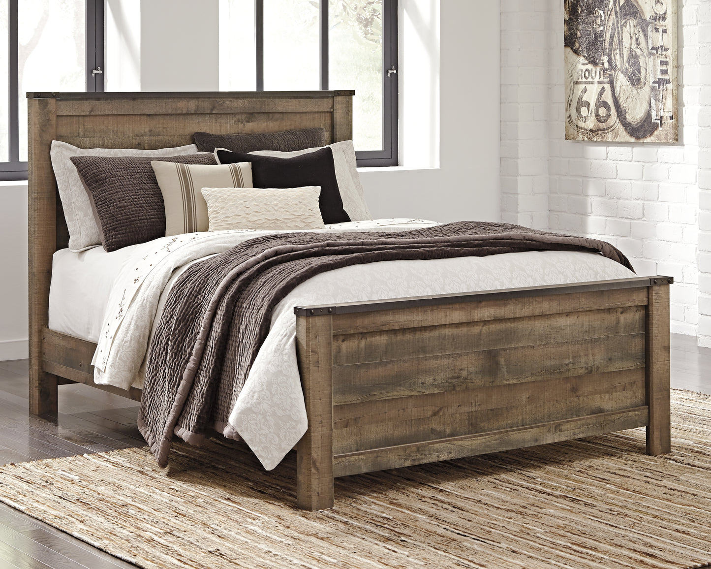 The Furniture Outlets - Ashley Furniture - Trinell Bedroom - Queen Panel Bed / Brown - B446B11