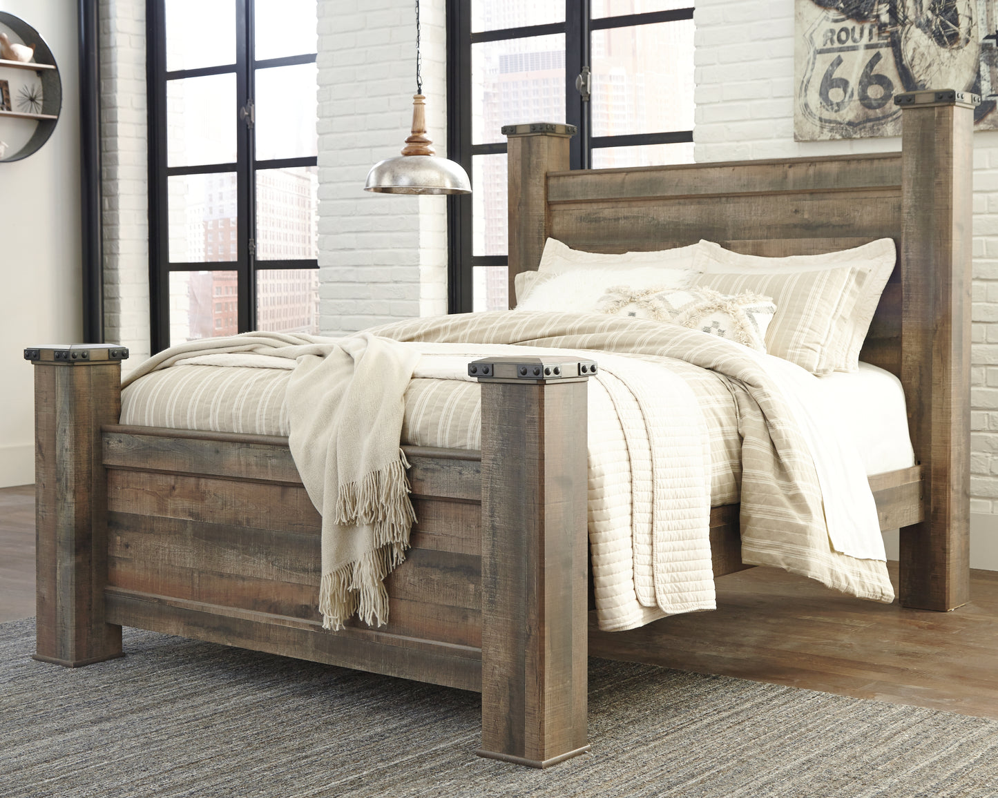 The Furniture Outlets - Ashley Furniture - Trinell Bedroom - Queen Poster Bed / Brown - B446B40