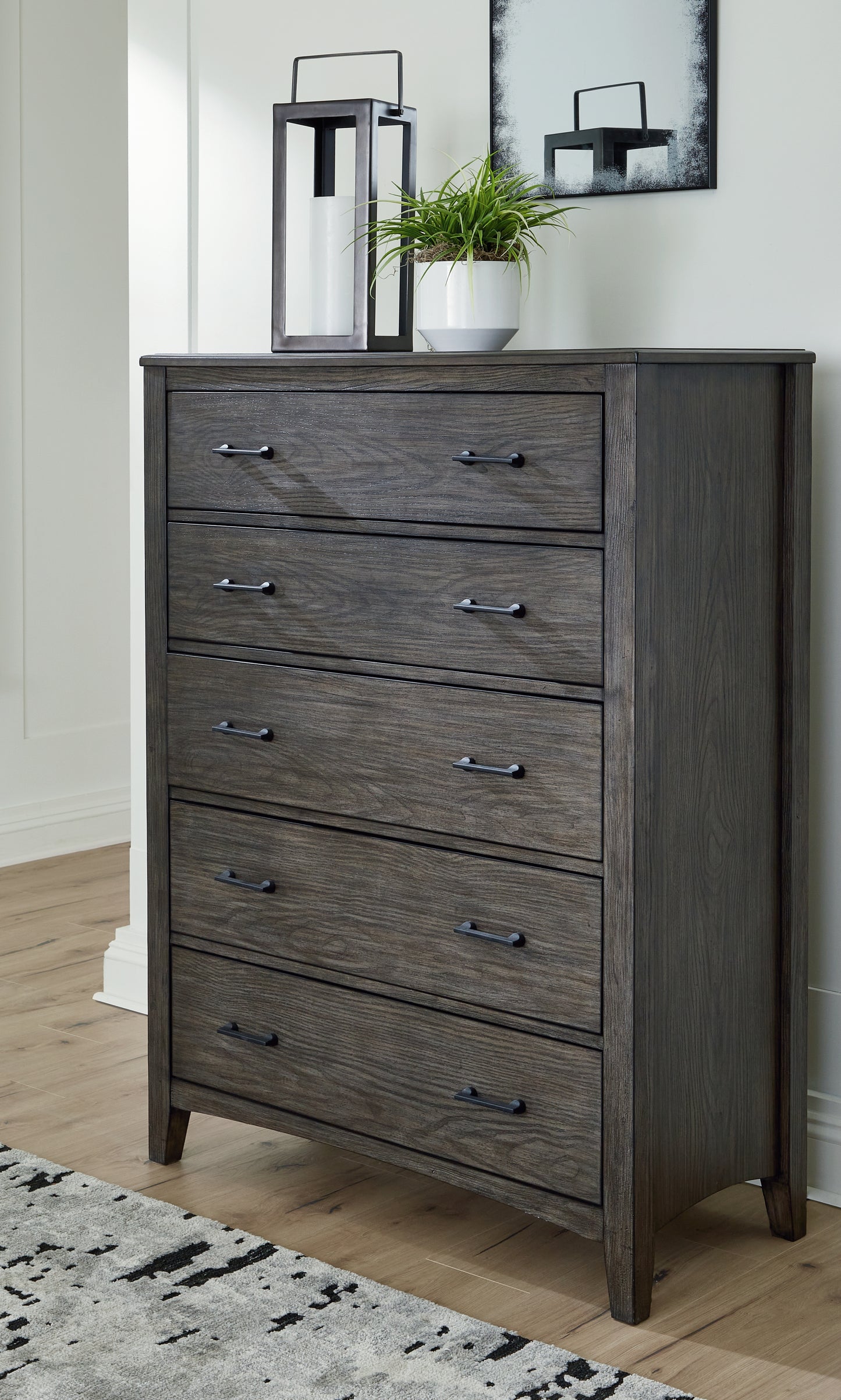 The Furniture Outlets - Ashley Furniture - Montillan Bedroom - Five Drawer Chest / Grayish Brown - B651-46