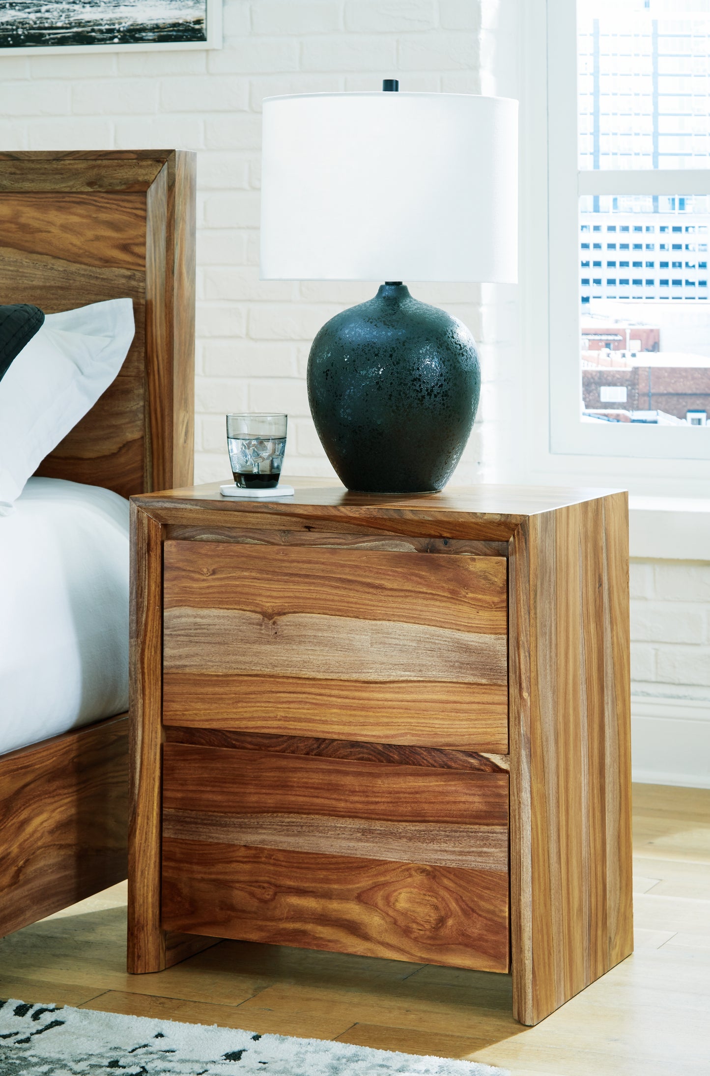The Furniture Outlets - Ashley Furniture - Dressonni Bedroom - Two Drawer Night Stand / Brown - B790-92