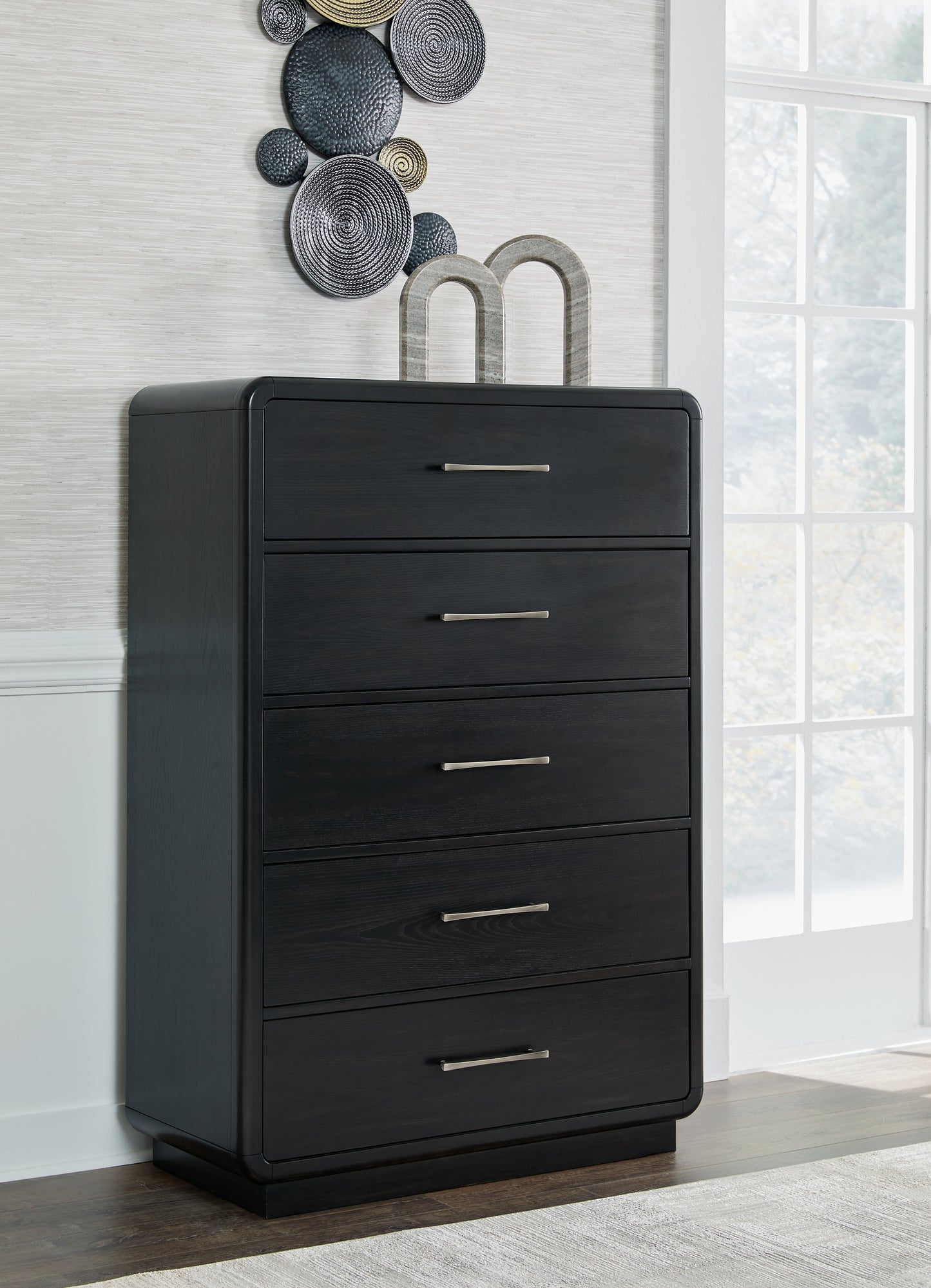 The Furniture Outlets - Ashley Furniture - Rowanbeck Bedroom - Five Drawer Chest / Black - B821-46