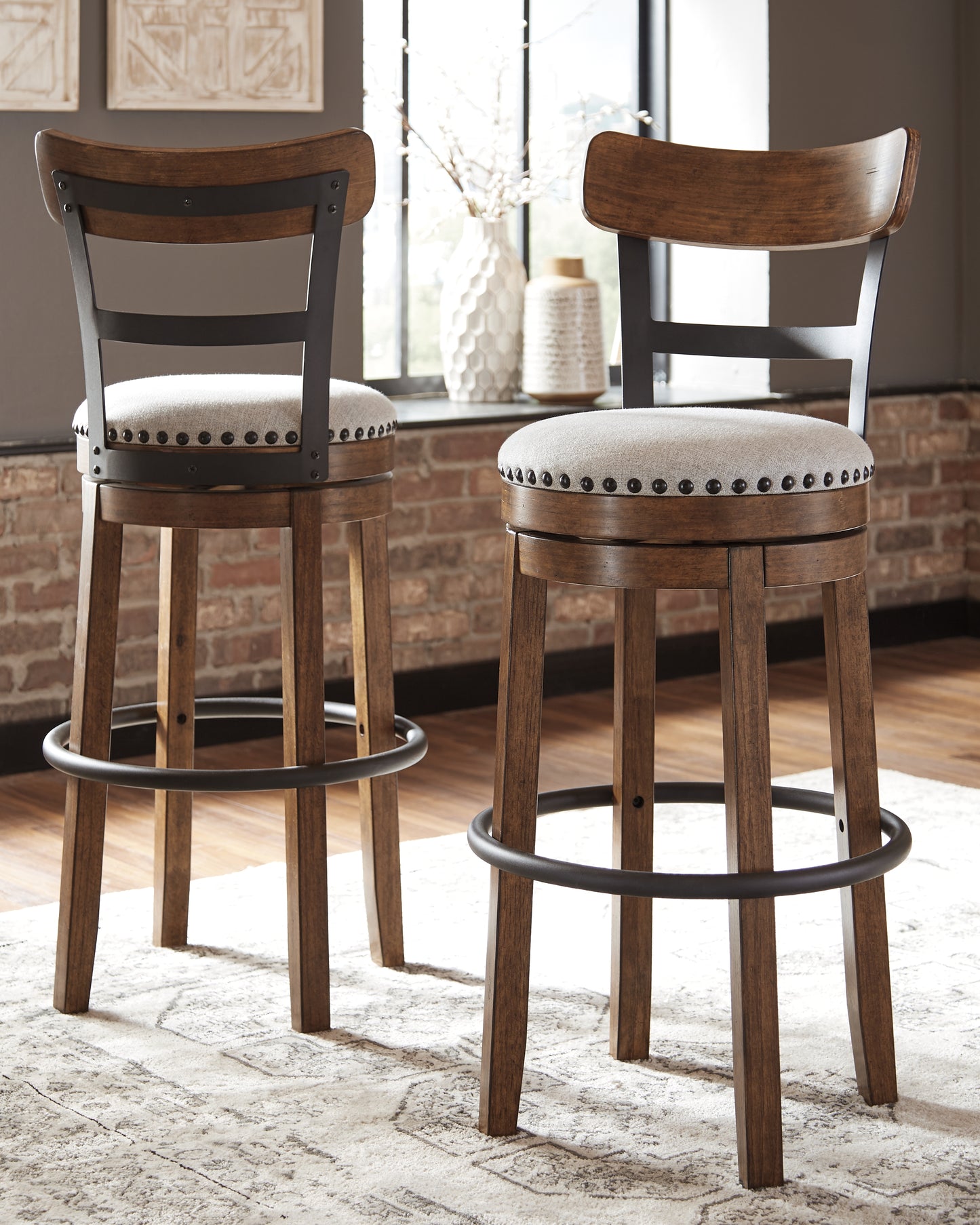 The Furniture Outlets - Ashley Furniture - Valebeck Dining Room - Tall UPH Swivel Barstool(1/CN) / Brown - D546-430