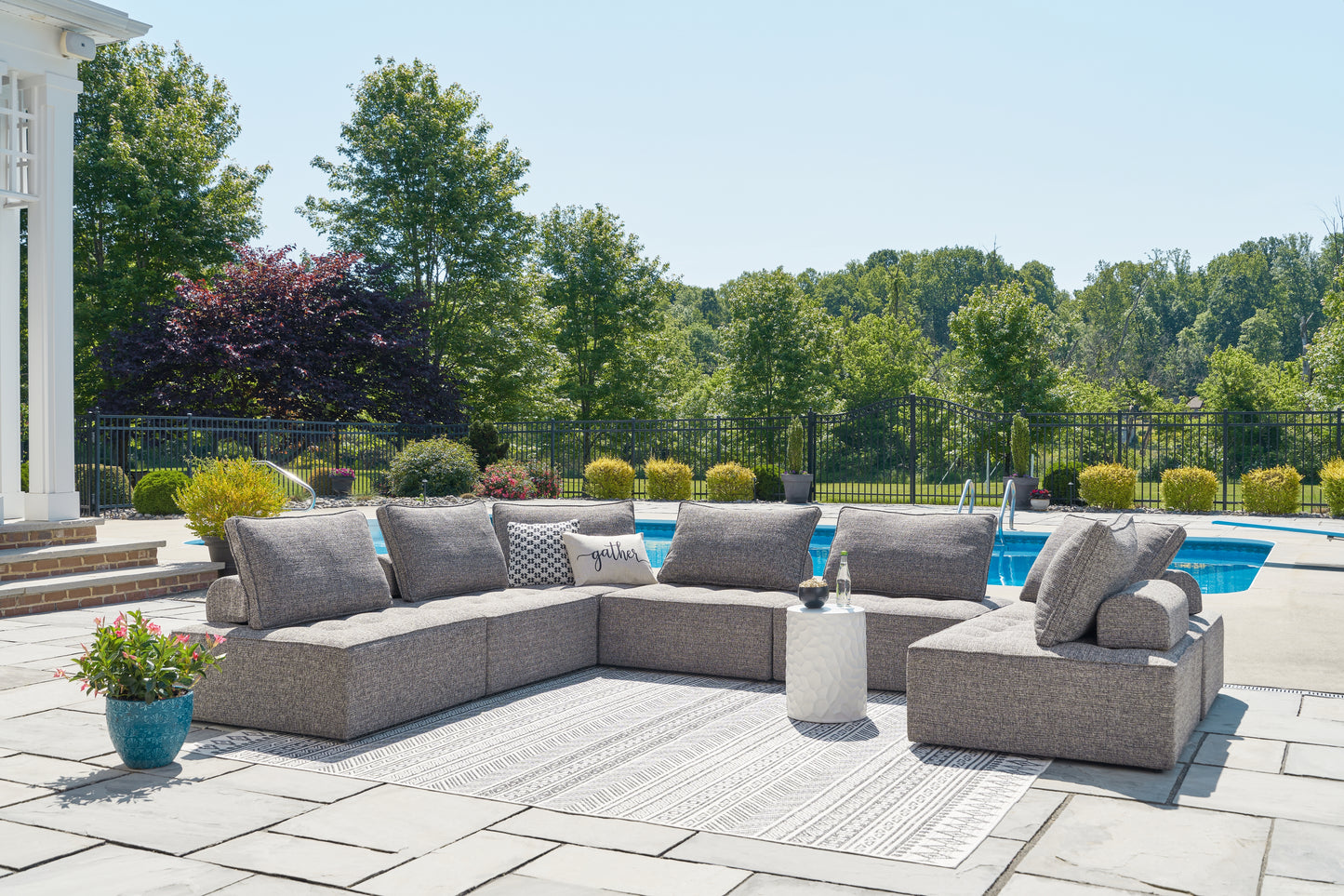The Furniture Outlets - Ashley Furniture - Bree Zee Outdoor - 7-Piece Outdoor Sectional / Brown - P160P2
