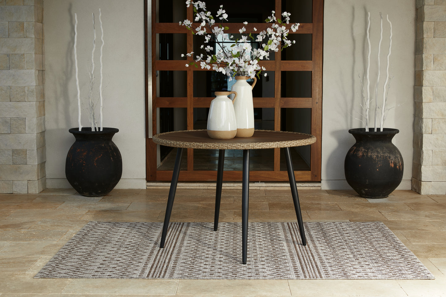 The Furniture Outlets - Ashley Furniture - Amaris Outdoor - Round Dining Table / Brown/Black - P369-615