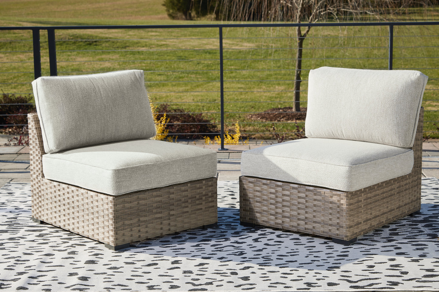 The Furniture Outlets - Ashley Furniture - Calworth Outdoor - Armless Chair w/Cushion (Set of 2) / Beige - P458-846