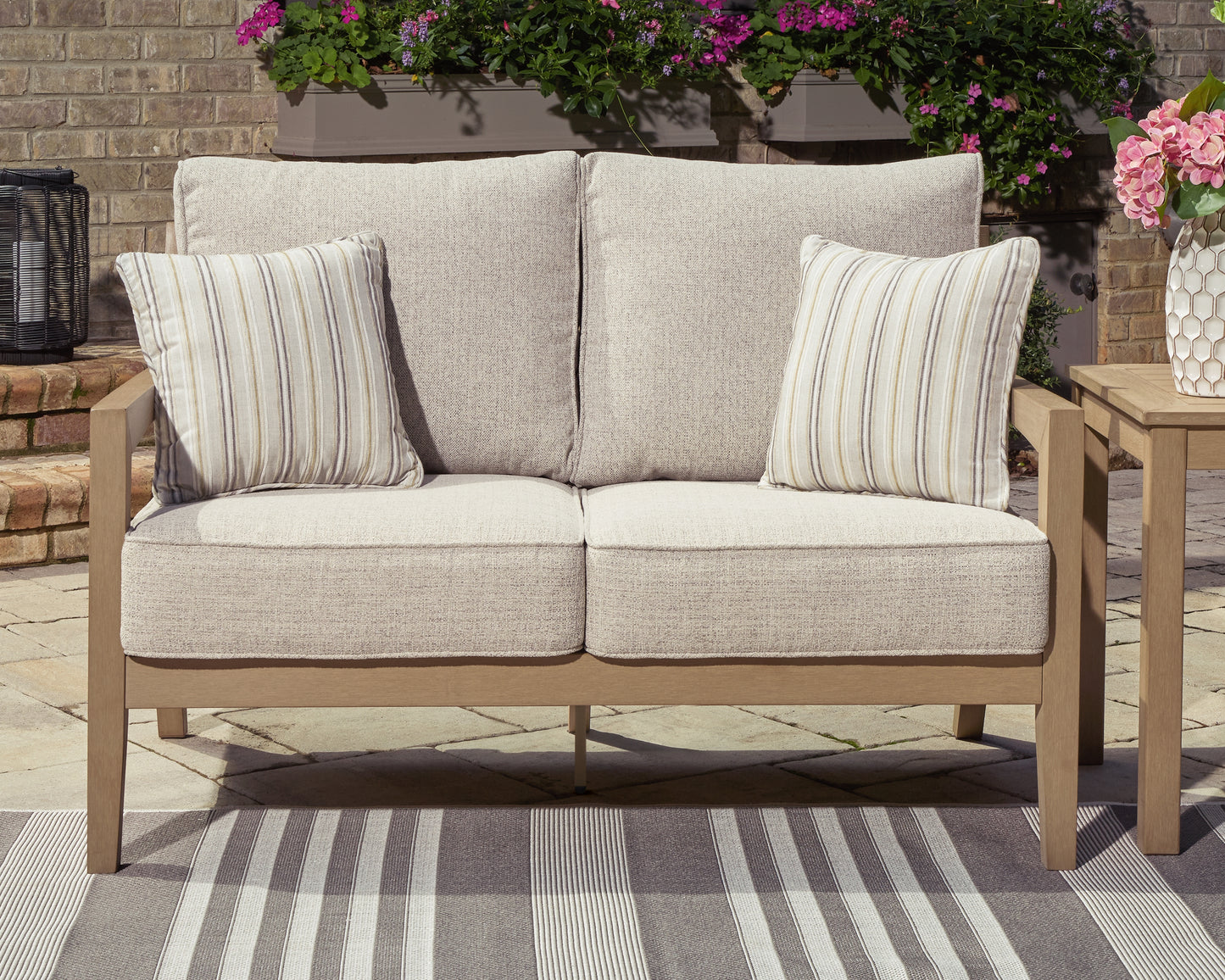 The Furniture Outlets - Ashley Furniture - Hallow Creek Outdoor - Loveseat w/Cushion / Driftwood - P560-835