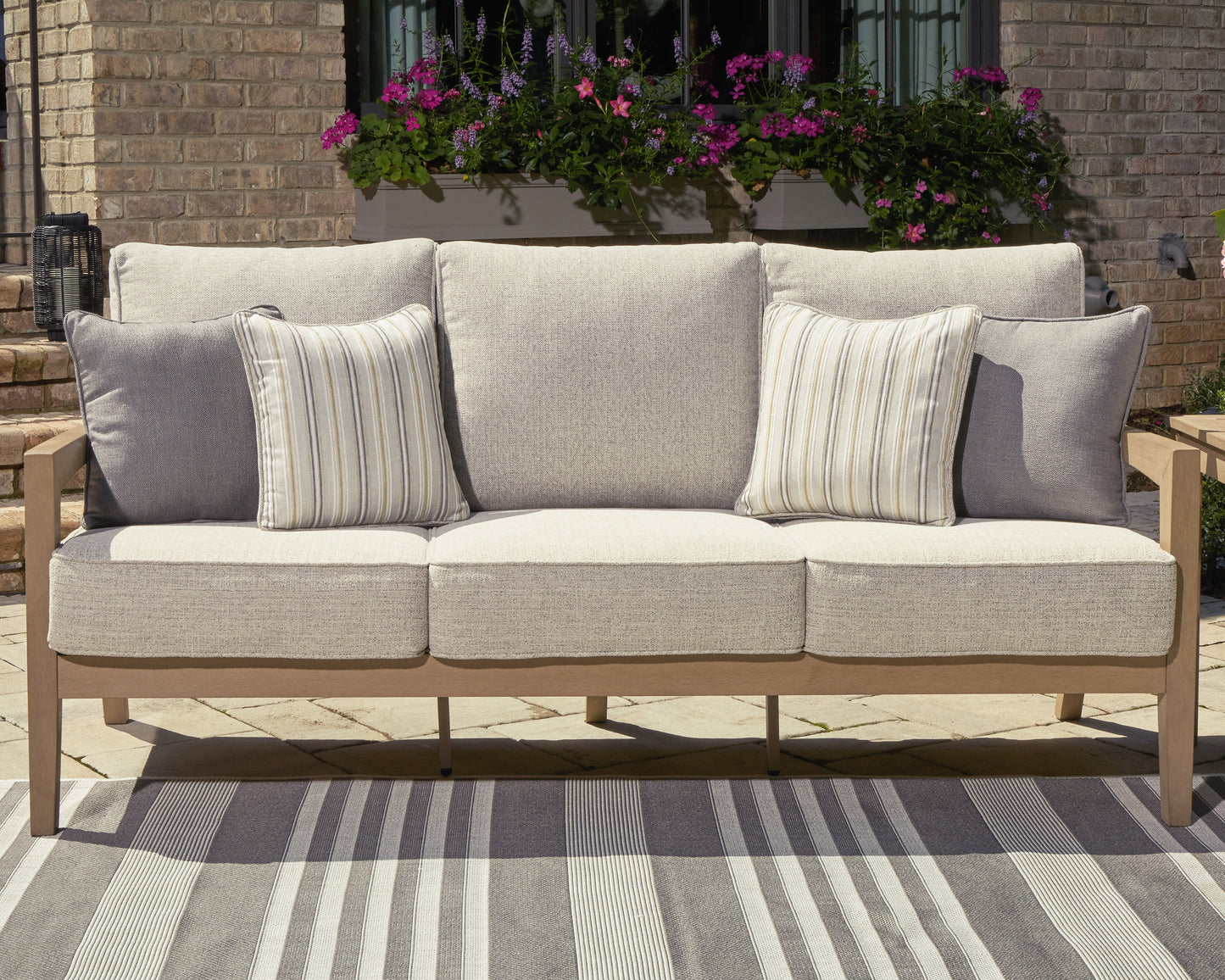 The Furniture Outlets - Ashley Furniture - Hallow Creek Outdoor - Rectangular Cocktail Table / Driftwood - P560-701