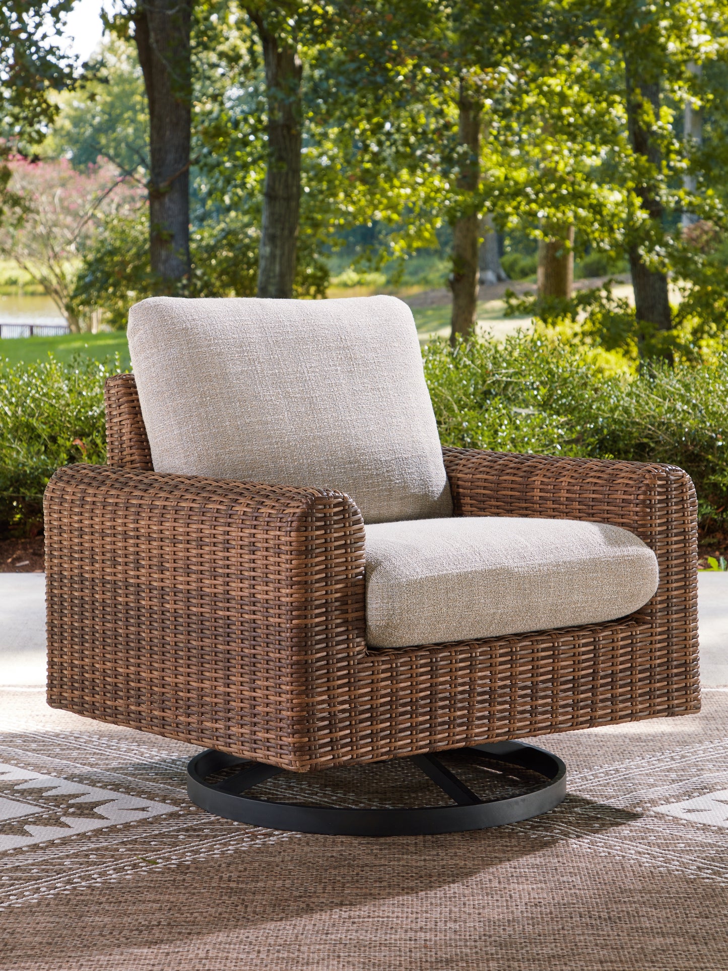 The Furniture Outlets - Ashley Furniture - Dolan Creek Outdoor - Swivel Lounge w/ Cushion / Gray/Brown - PCP610-821