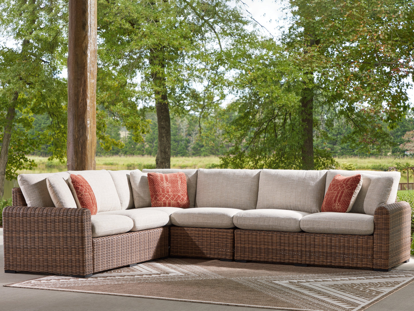 The Furniture Outlets - Ashley Furniture - Dolan Creek Outdoor - 4-Piece Outdoor Sectional / Beige/Brown - PCP610P2