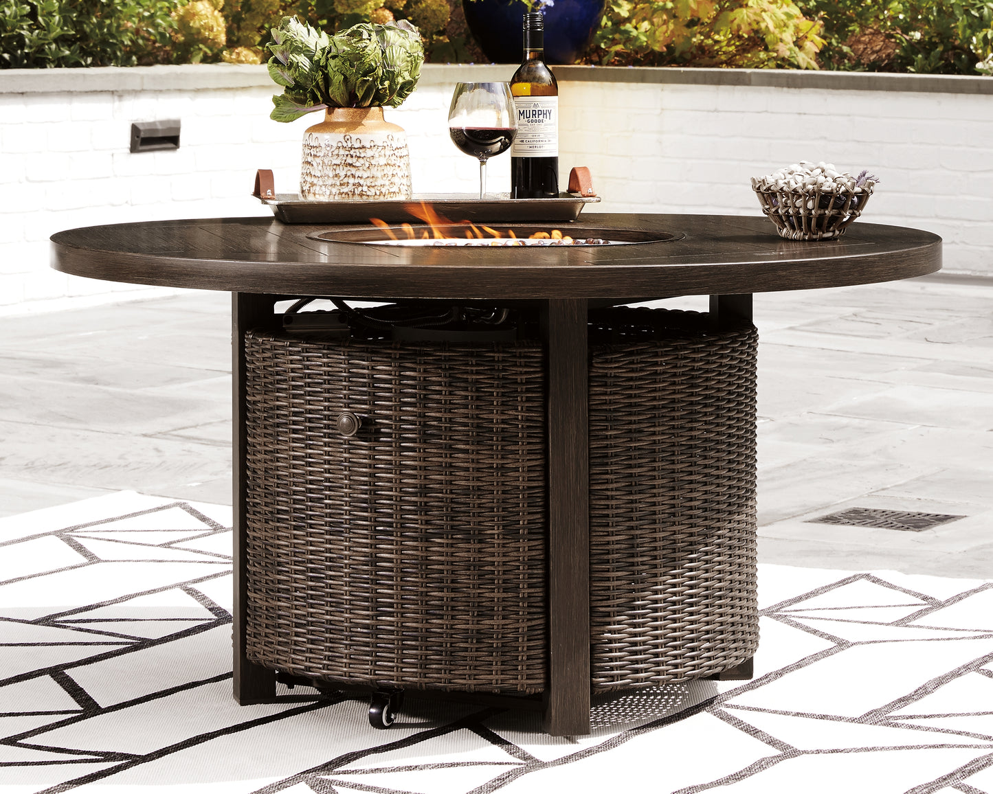 The Furniture Outlets - Ashley Furniture - Paradise Trail Outdoor - Round Fire Pit Table / Medium Brown - P750-776
