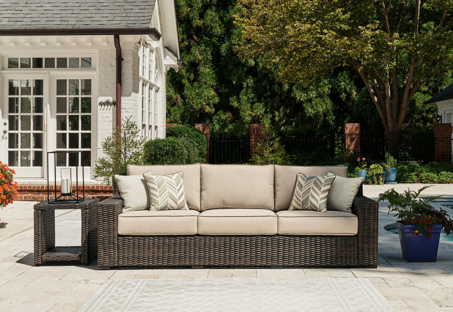 The Furniture Outlets - Ashley Furniture - Coastline Bay Outdoor - Sofa with Cushion / Brown - P784-838