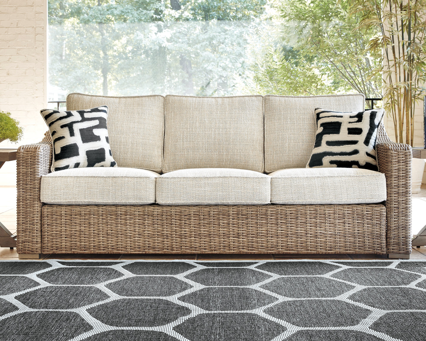 The Furniture Outlets - Ashley Furniture - Beachcroft Outdoor - Sofa with Cushion / Beige - P791-838