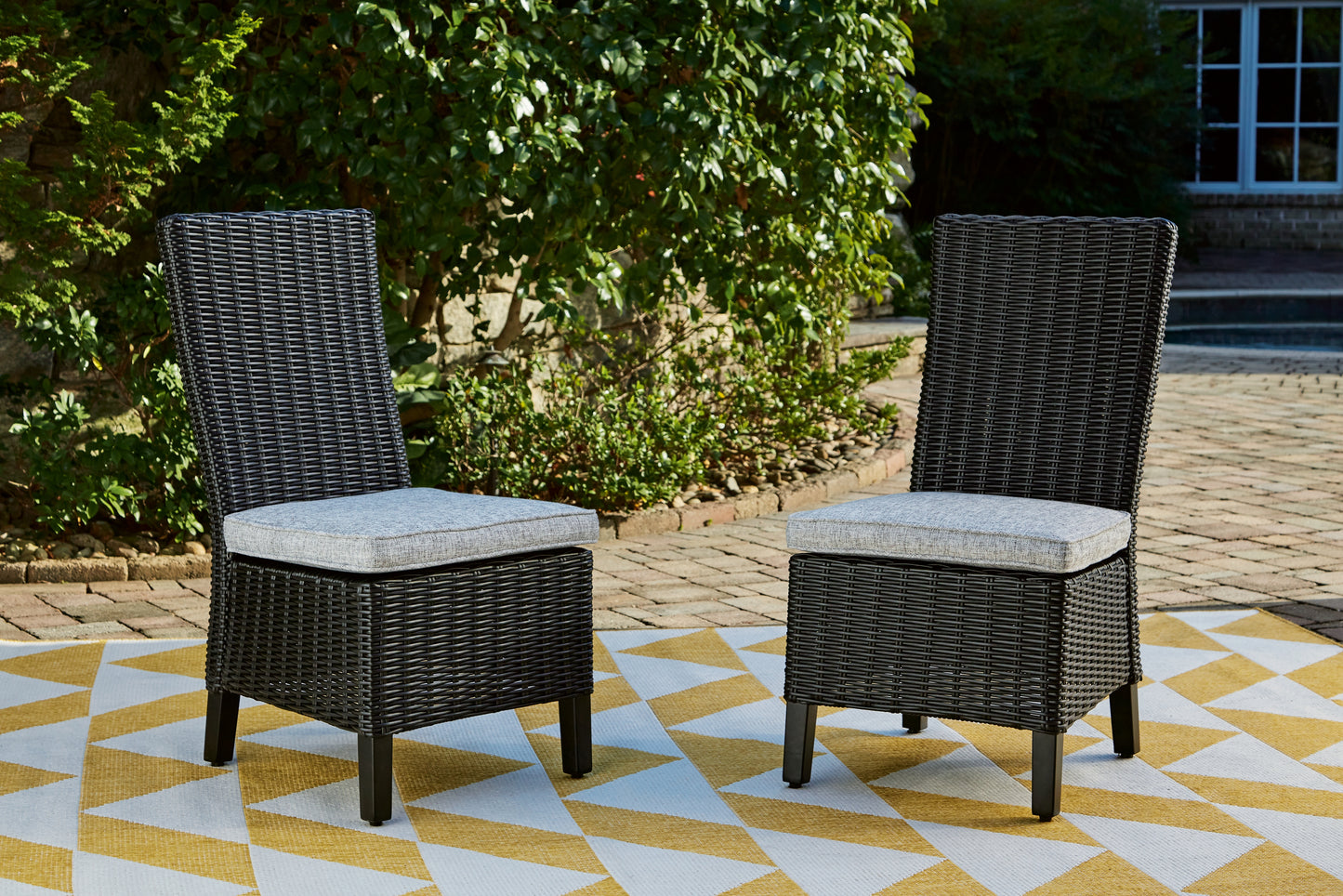 The Furniture Outlets - Ashley Furniture - Beachcroft Outdoor - Side Chair with Cushion (Set of 2) / Black/Light Gray - P792-601