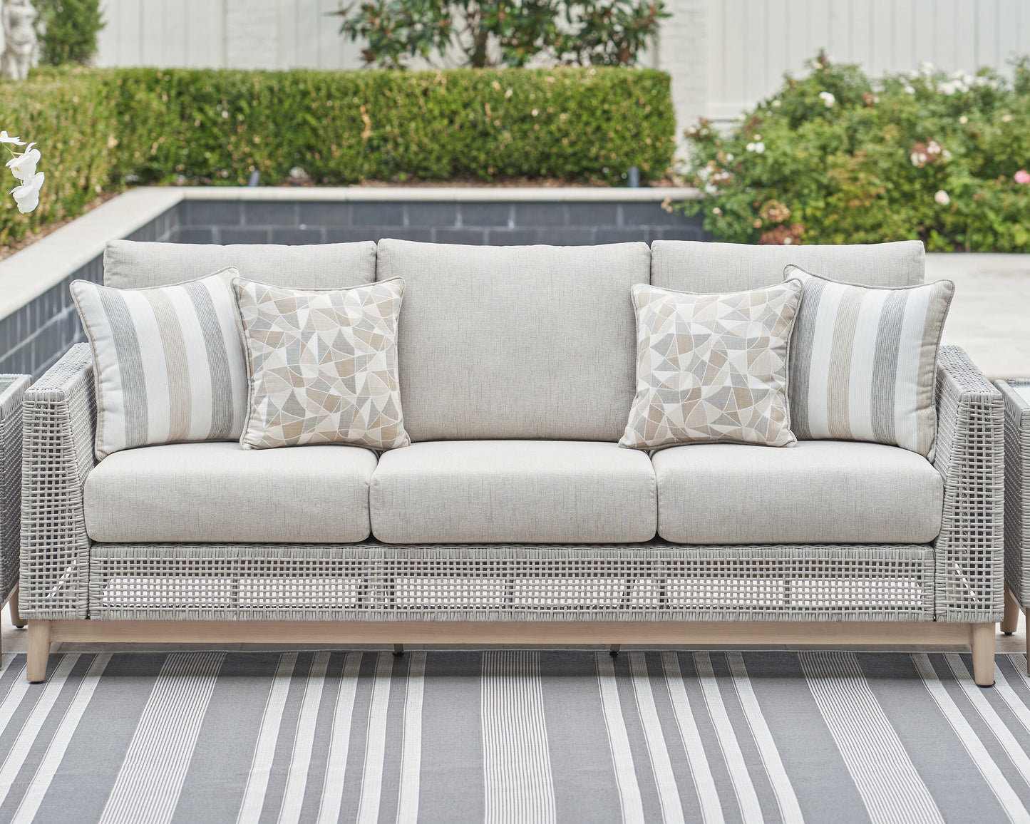 The Furniture Outlets - Ashley Furniture - Seton Creek Outdoor - Sofa with Cushion / Gray - P798-838