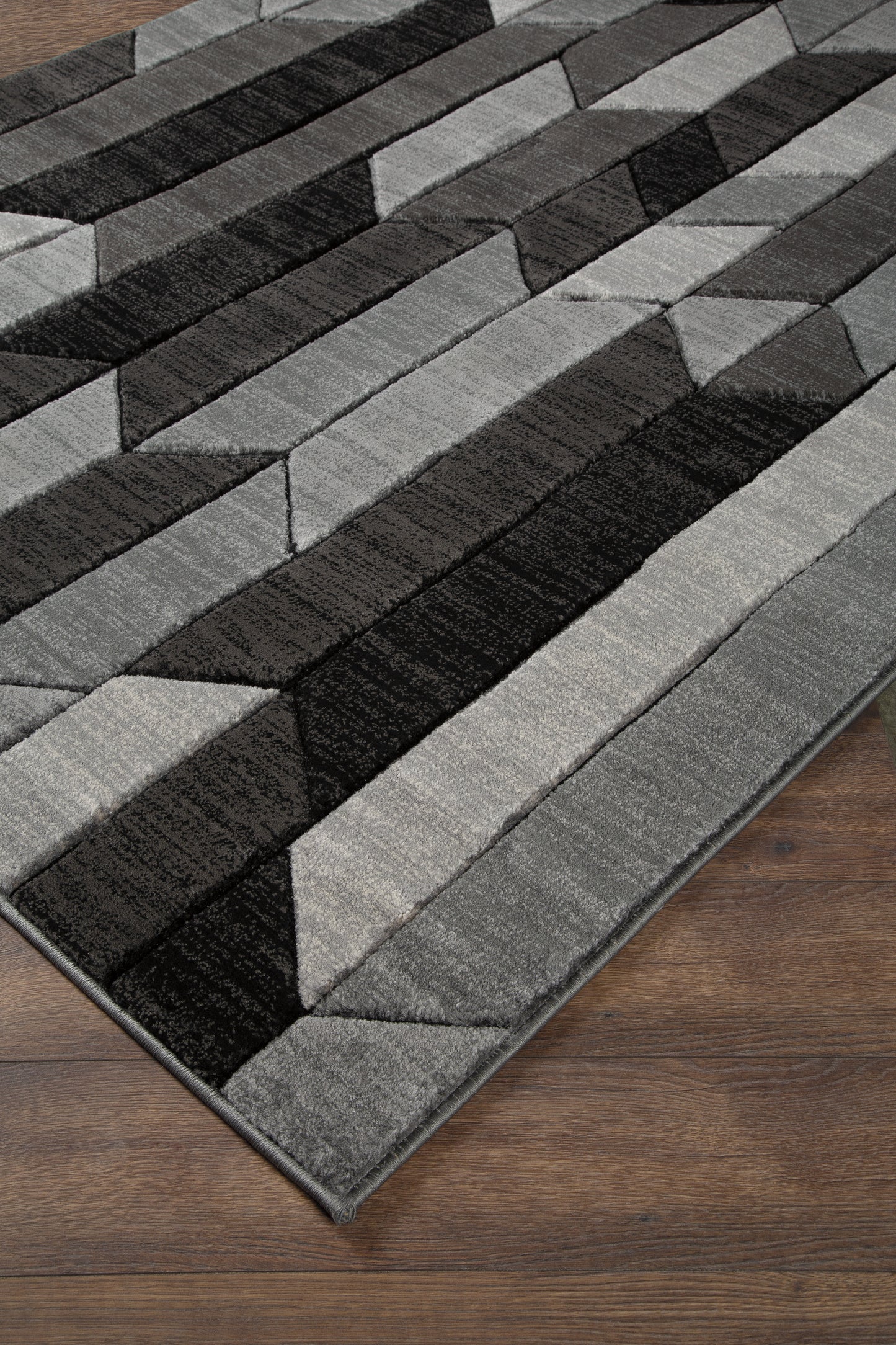 The Furniture Outlets - Ashley Furniture - Chayse Rug - 6'6" x 9'6" Rug / Black/Gray - R403461