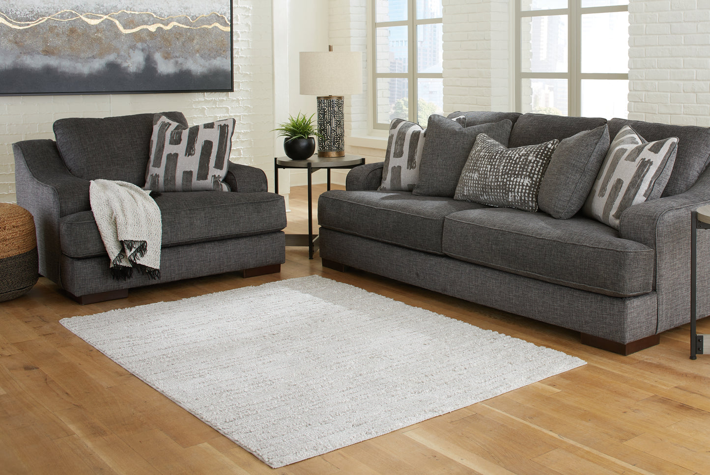 The Furniture Outlets - Ashley Furniture - Ivygail Rug - 7'5" x 9'6" Rug / Gray - R404511