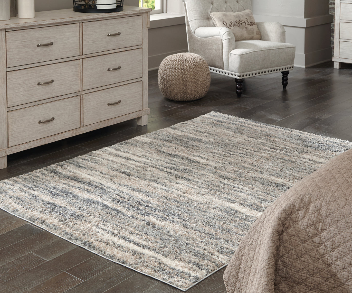 The Furniture Outlets - Ashley Furniture - Gizela Rug - 7'10" x 10' Rug / Ivory/Beige/Gray - R404861