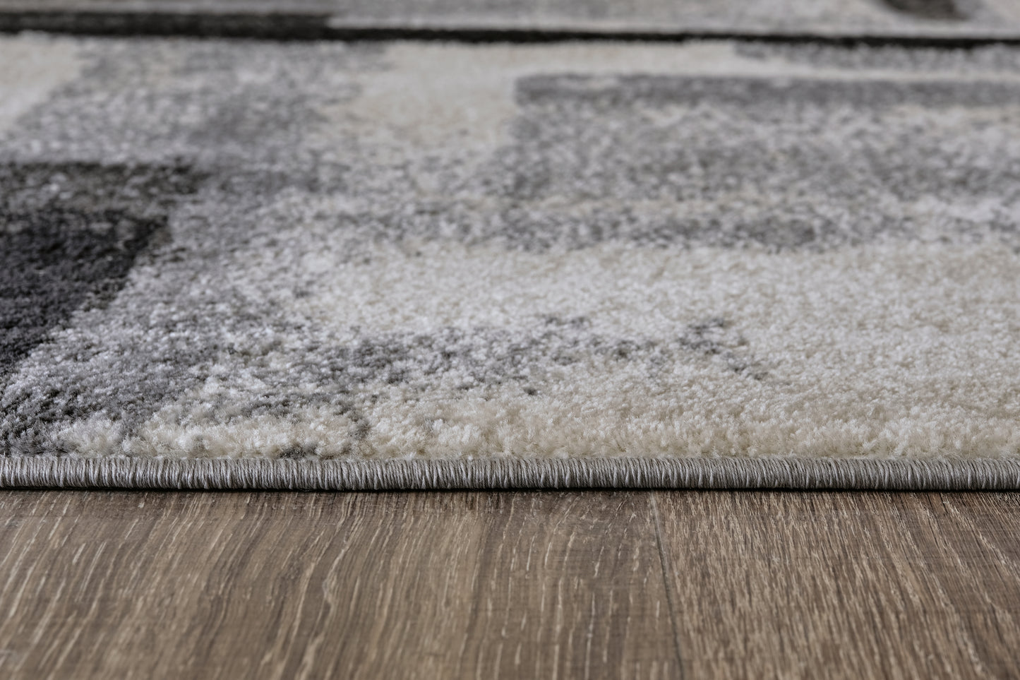 The Furniture Outlets - Ashley Furniture - Brycebourne Rug - 5'3" x 7'7" Rug / Black/Cream/Gray - R404982