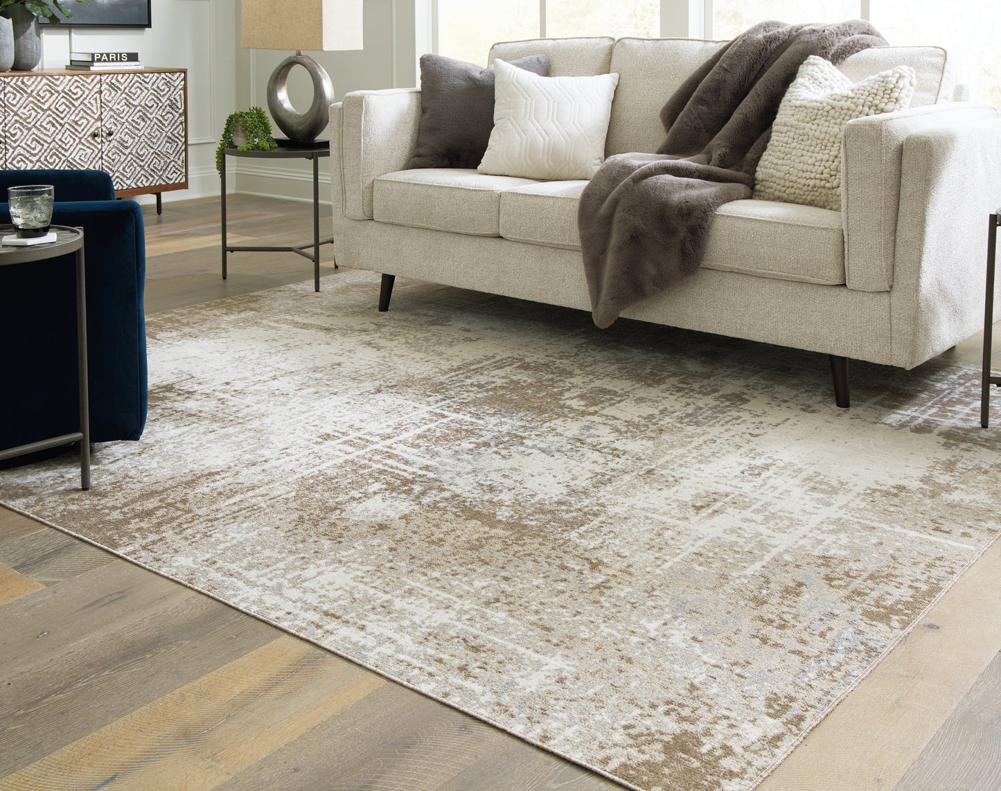 The Furniture Outlets - Ashley Furniture - Grifflain Rug - 7'10" x 10'3" Washable Rug / Tan/Brown/Gray - R406231
