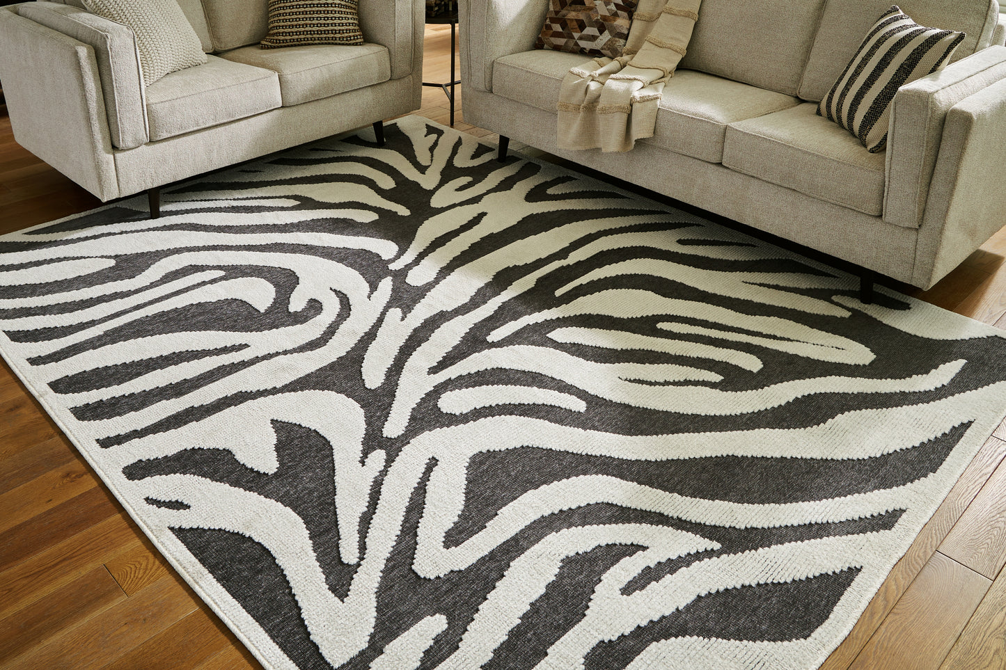 The Furniture Outlets - Ashley Furniture - Thomwith Rug - 8' x 10'2" Washable Rug / Black/Ivory - R406291