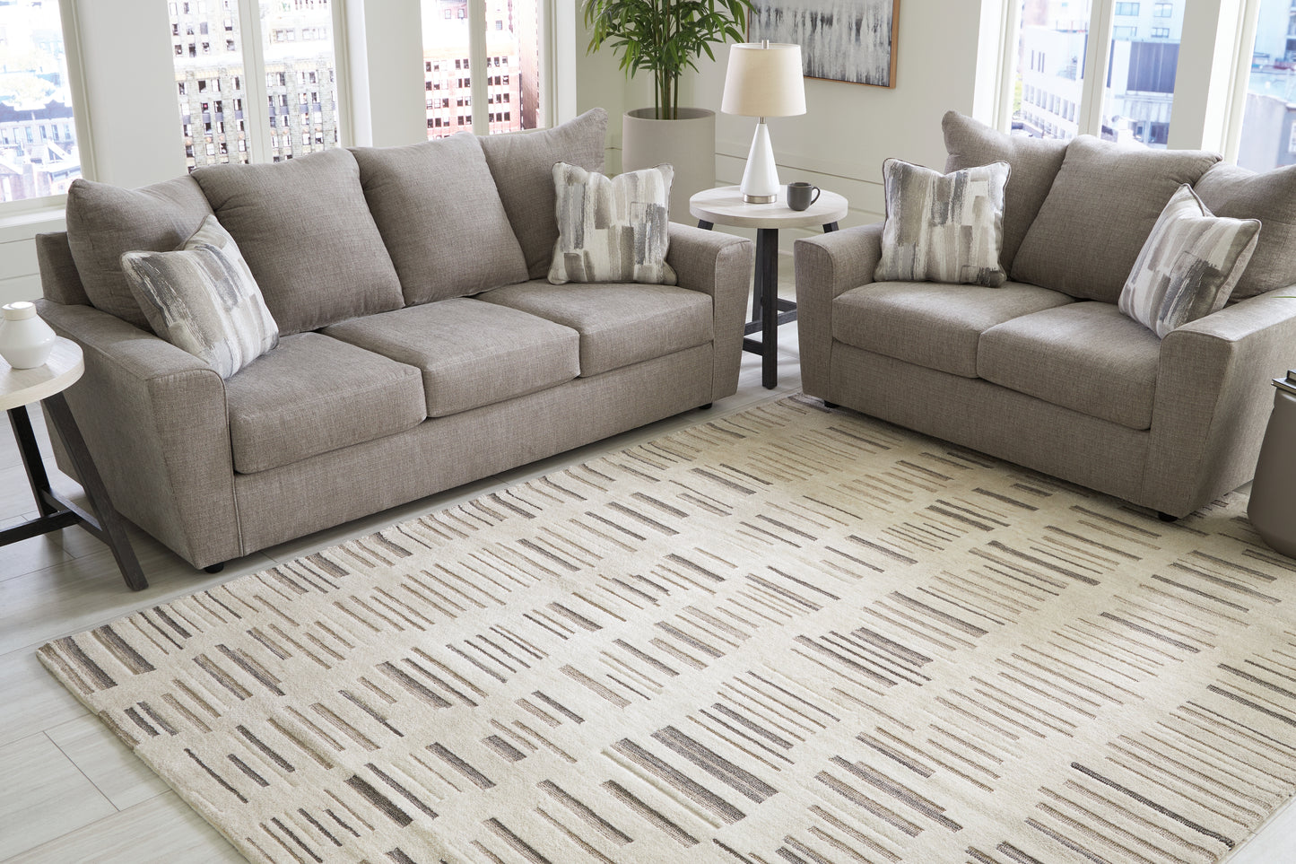 The Furniture Outlets - Ashley Furniture - Leesdale Rug - 8' x 10' Rug / Ivory/Brown/Black - R406421