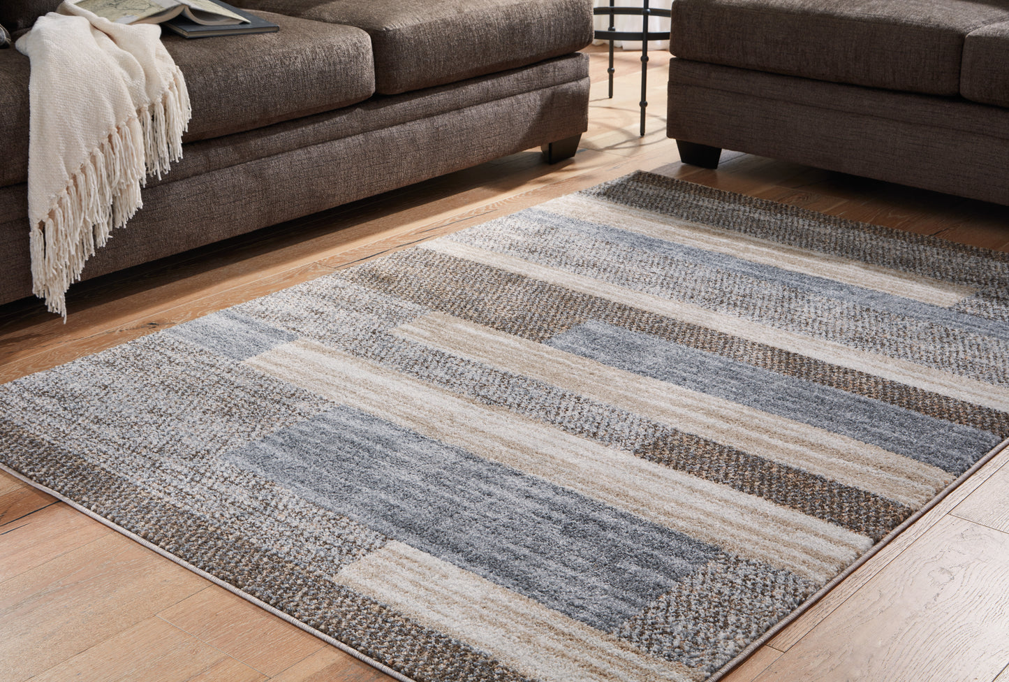 The Furniture Outlets - Ashley Furniture - Sethburn Rug - 5' x 7' Rug / Cream/Brown/Gray - R406592