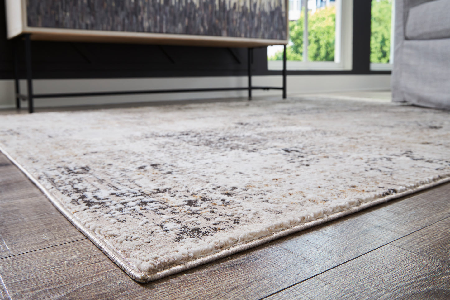 The Furniture Outlets - Ashley Furniture - Elaning Rug - 8' x 10' Rug / Black/Gray/Cream - R406701