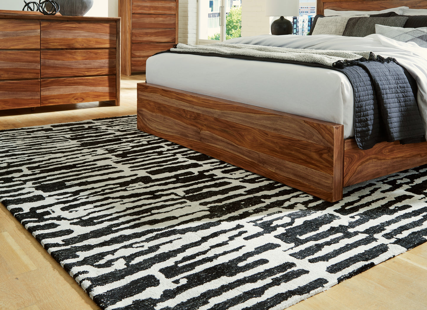 The Furniture Outlets - Ashley Furniture - Bramshaw Rug - 8' x 10' Rug / Black/Ivory - R406761
