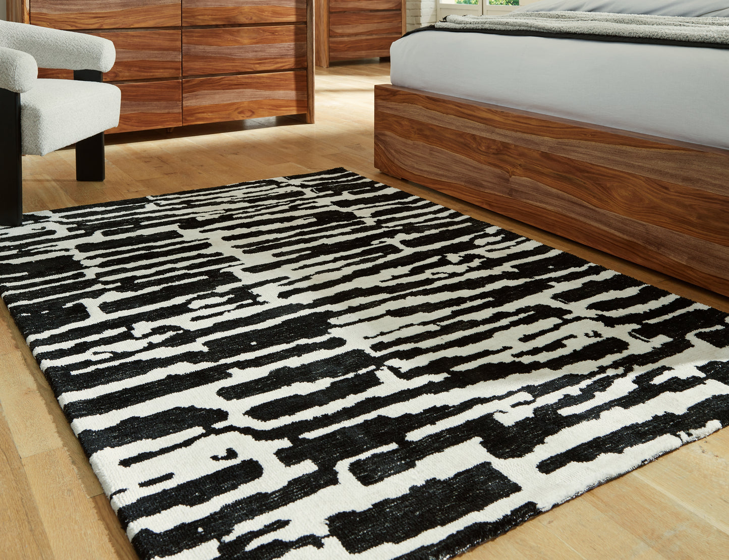 The Furniture Outlets - Ashley Furniture - Bramshaw Rug - 5' x 7' Rug / Black/Ivory - R406762