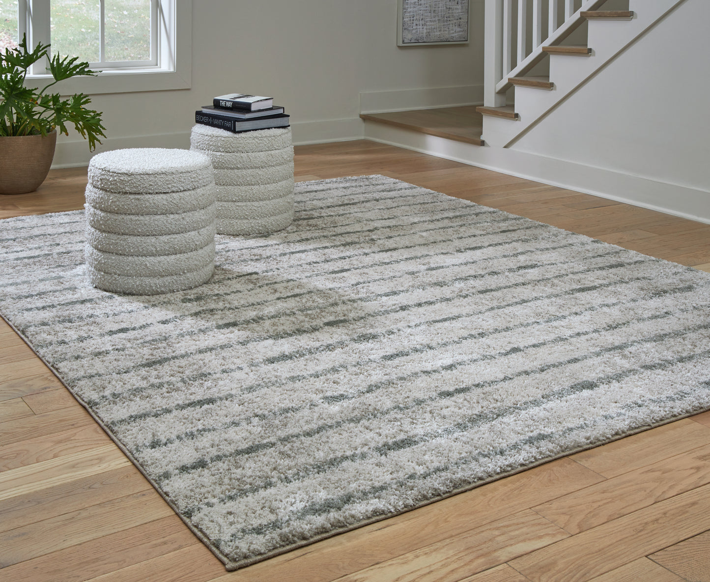 The Furniture Outlets - Ashley Furniture - Laddway Rug - 8' x 10' Rug / Cream/Green - R406881
