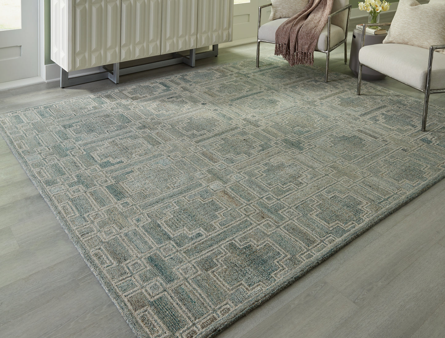 The Furniture Outlets - Ashley Furniture - Jossland Rug - 8' x 10' Rug / Green/Ivory - R406911