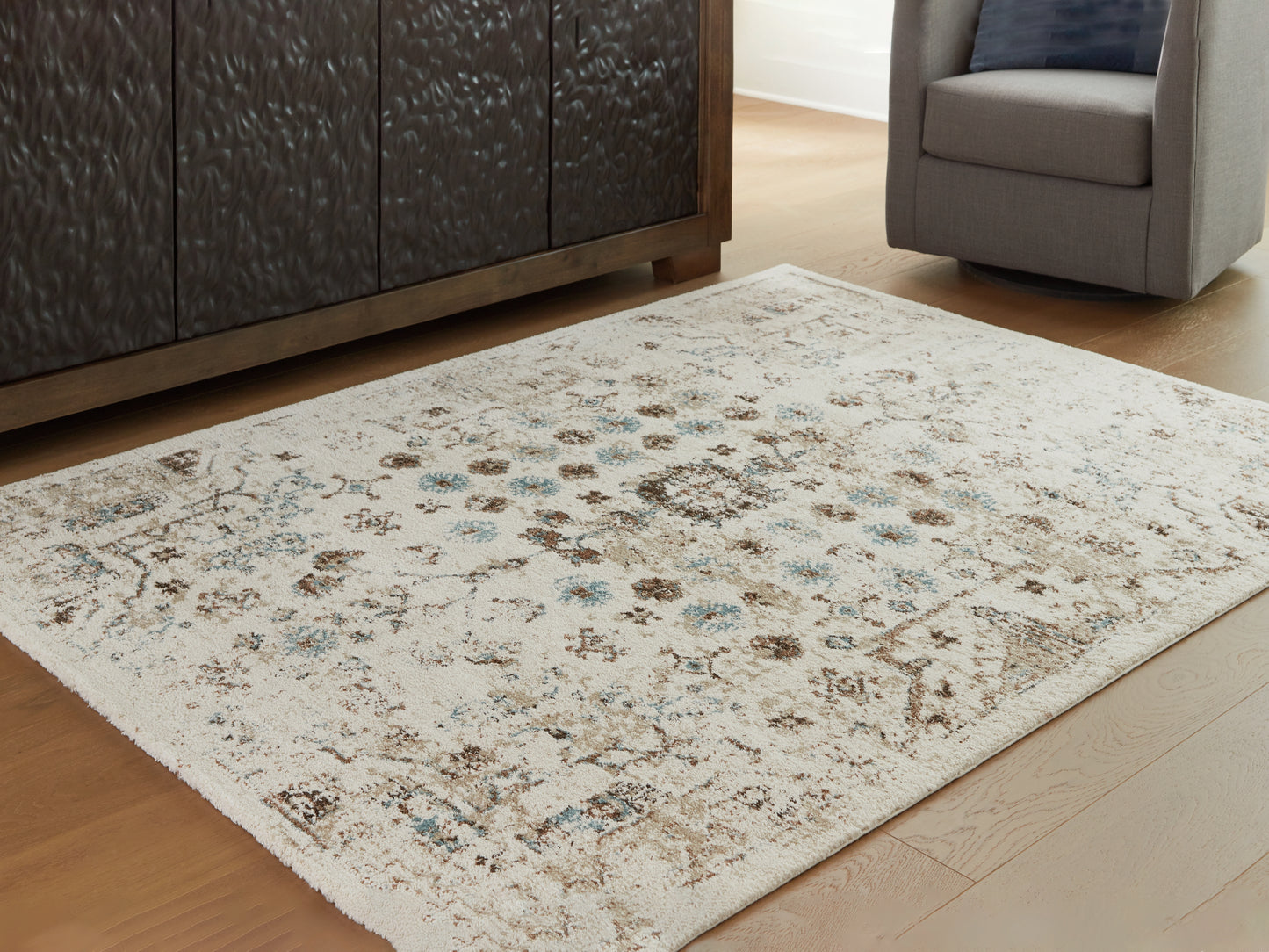 The Furniture Outlets - Ashley Furniture - Jossler Rug - 8' x 10' Rug / Ivory/Brown/Teal - R407071