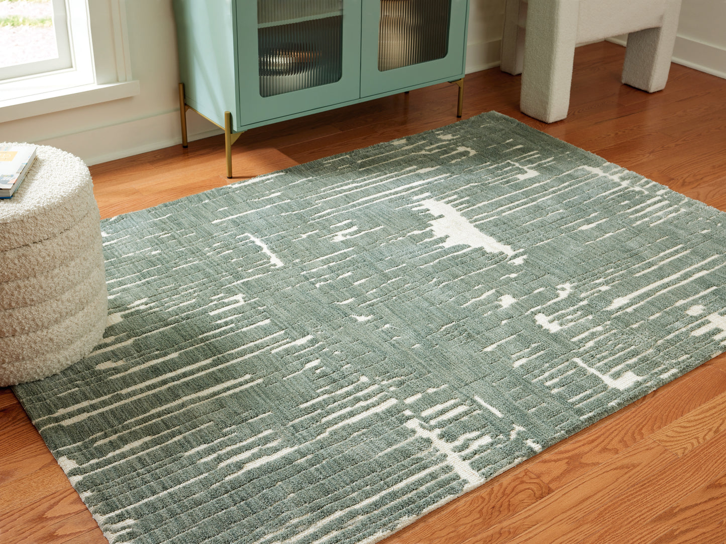 The Furniture Outlets - Ashley Furniture - Cayworth Rug - 5' x 7' Rug / Teal/White - R407092