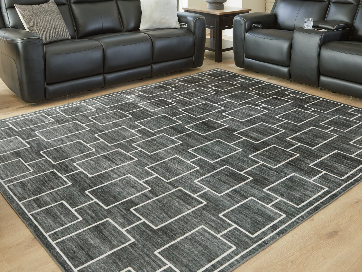 The Furniture Outlets - Ashley Furniture - Elderland Rug - Washable 7'6" x 9'6" Area Rug / Black/Gray - R407401