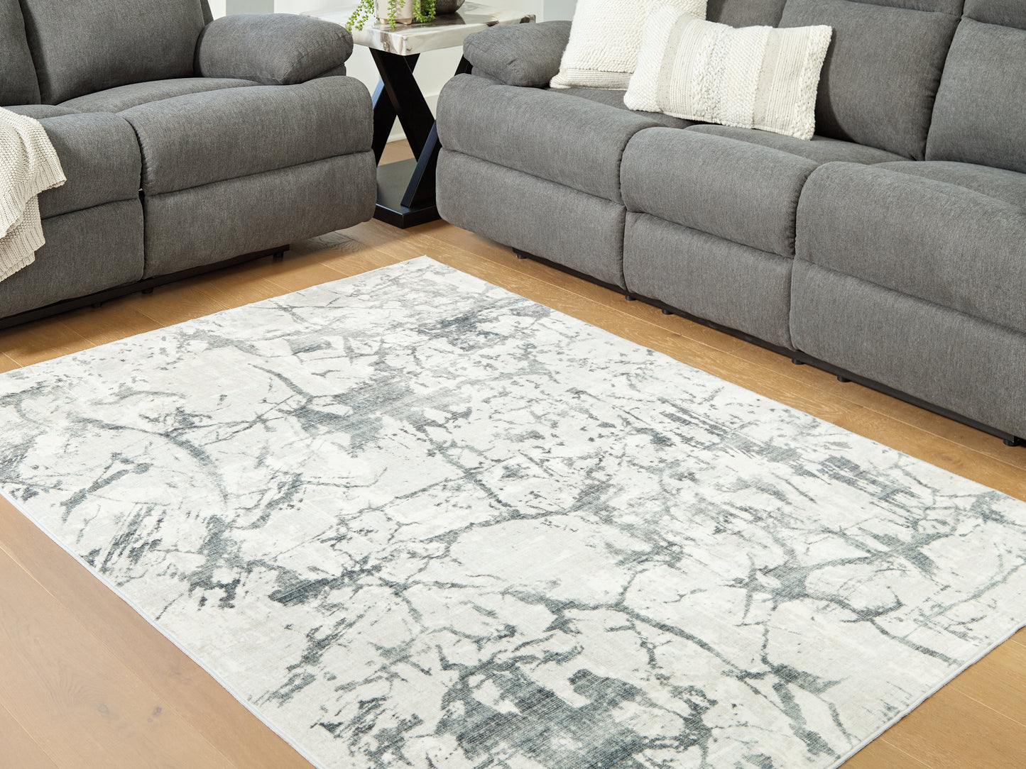 The Furniture Outlets - Ashley Furniture - Tobinbury Rug - Washable 5' x 7' Area Rug / Gray - R407422